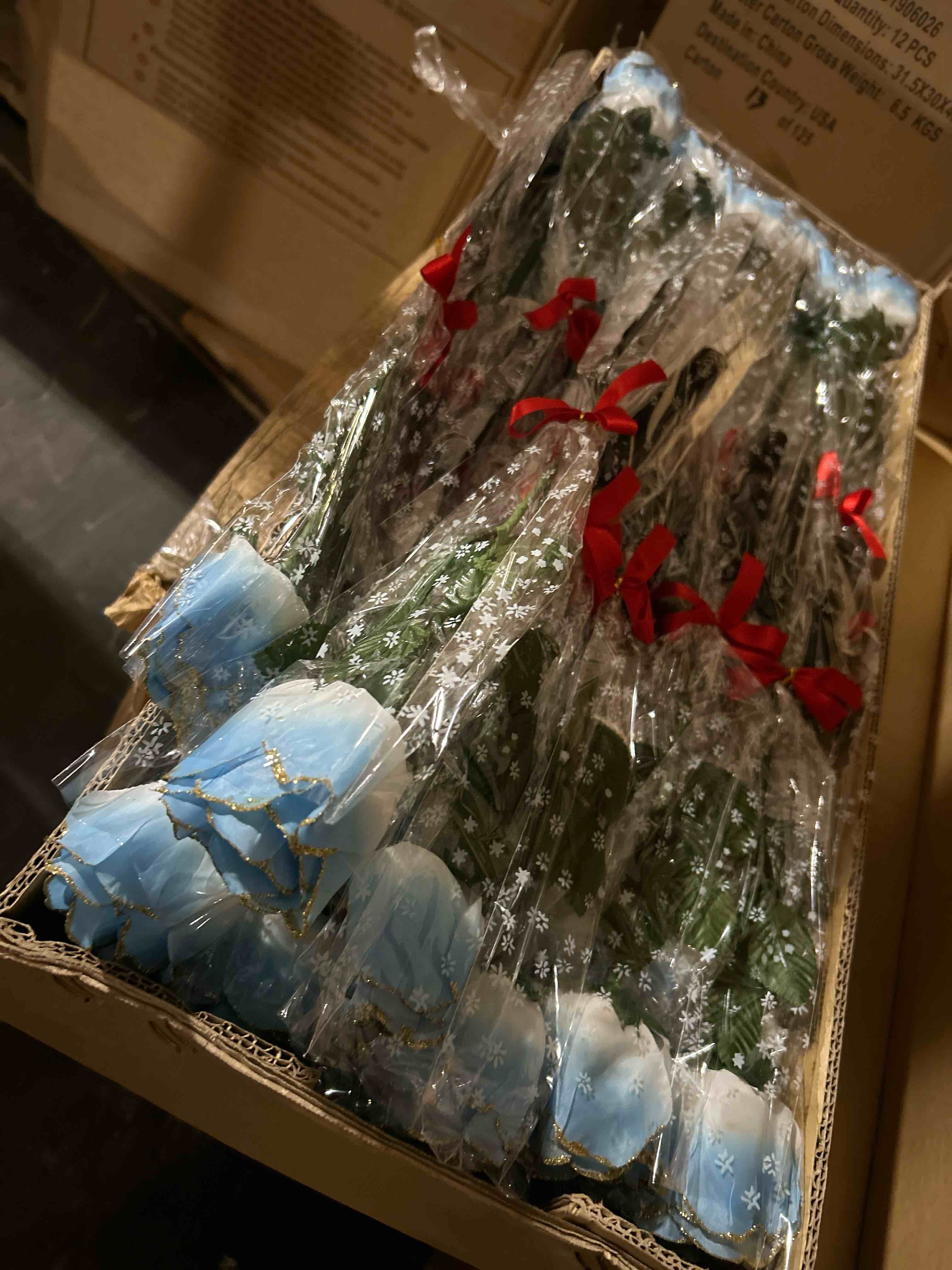 box of light blue roses 