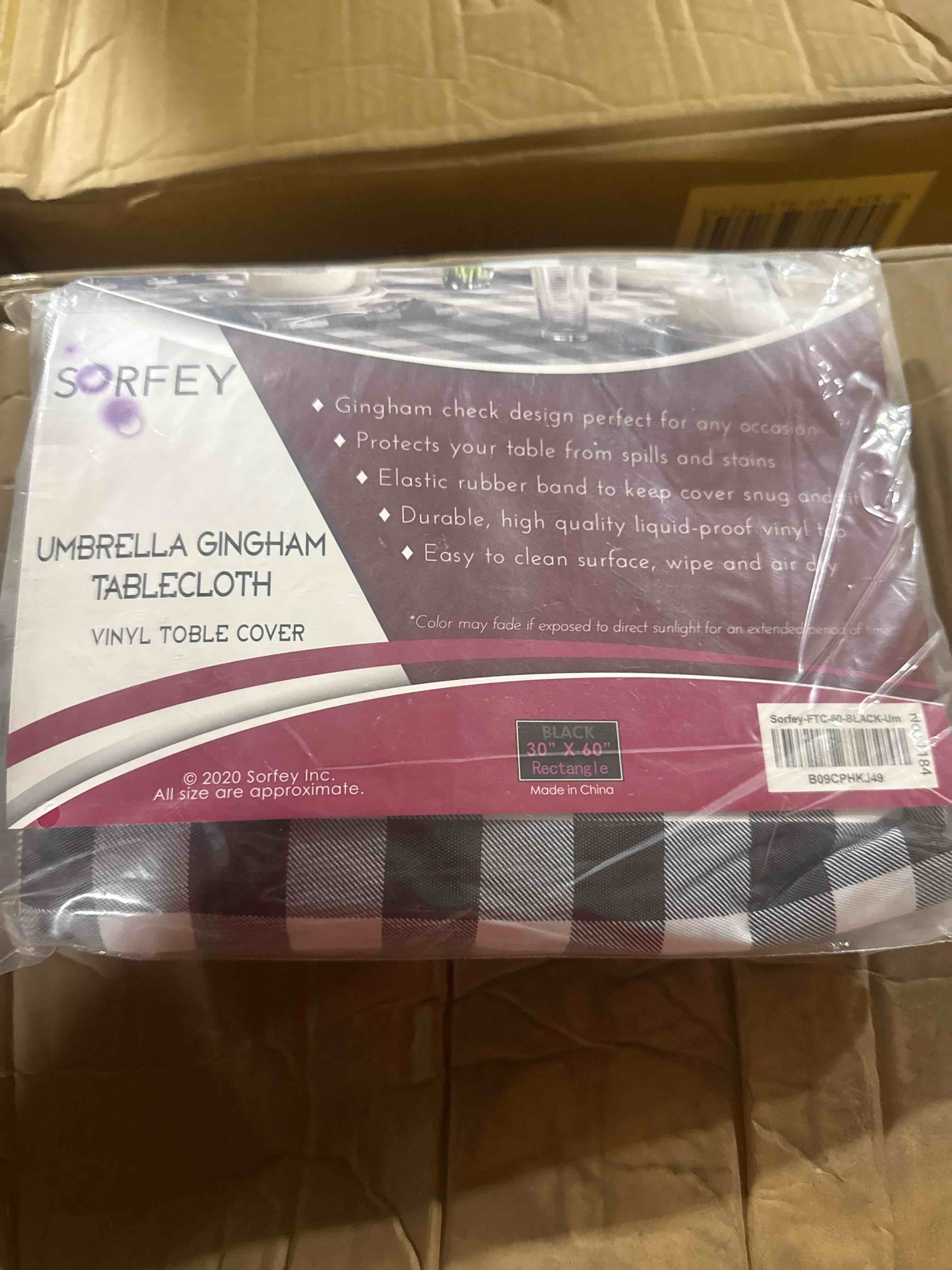 Condition photo showing New/Like New for sorfey umbrella gingham vinyl tablecloth black 30” x 60” rectangle