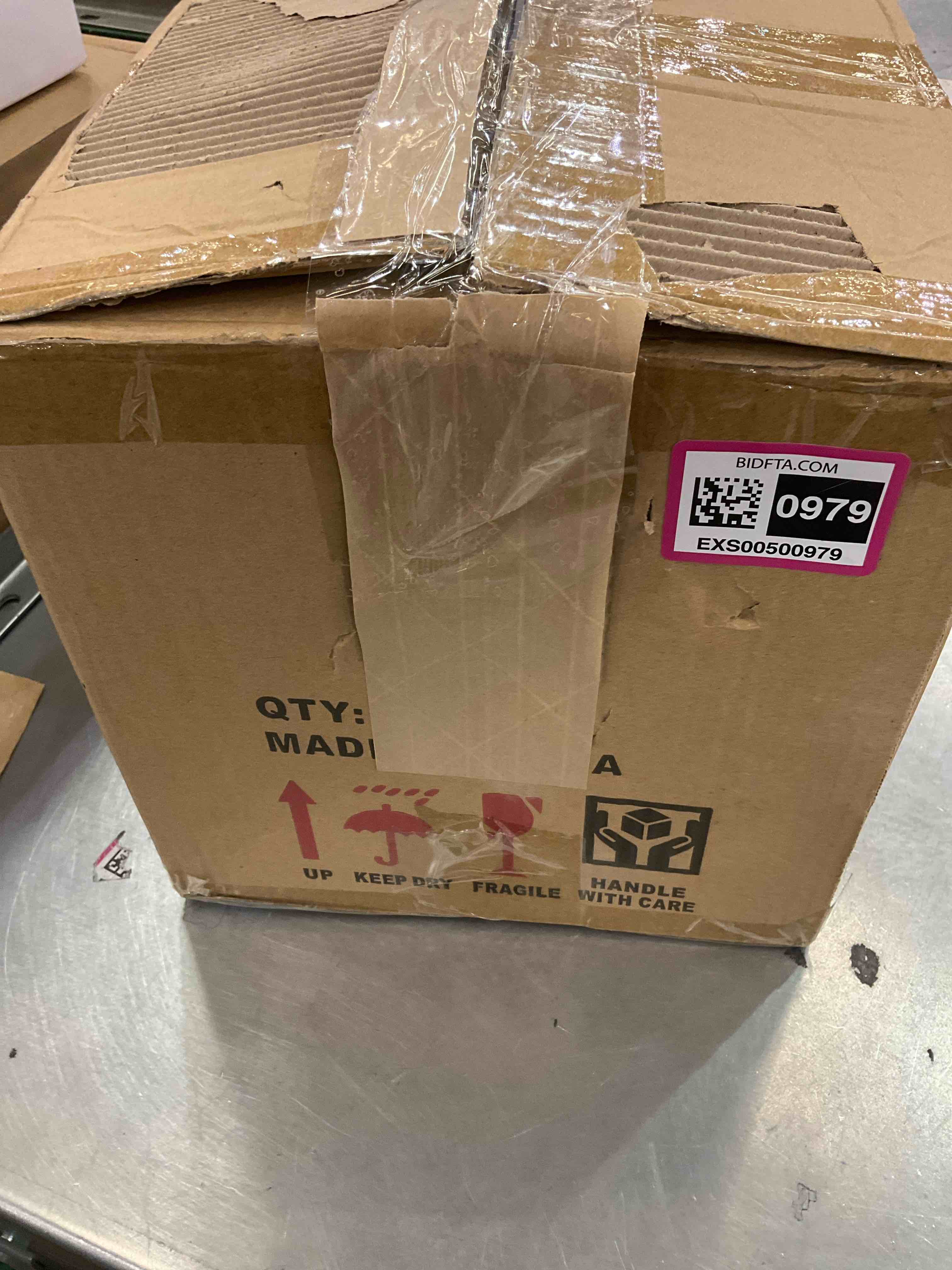 https://s3.amazonaws.com/lotting-images-prod/BargainHunt/EXS00500979_1710873019701.jpeg