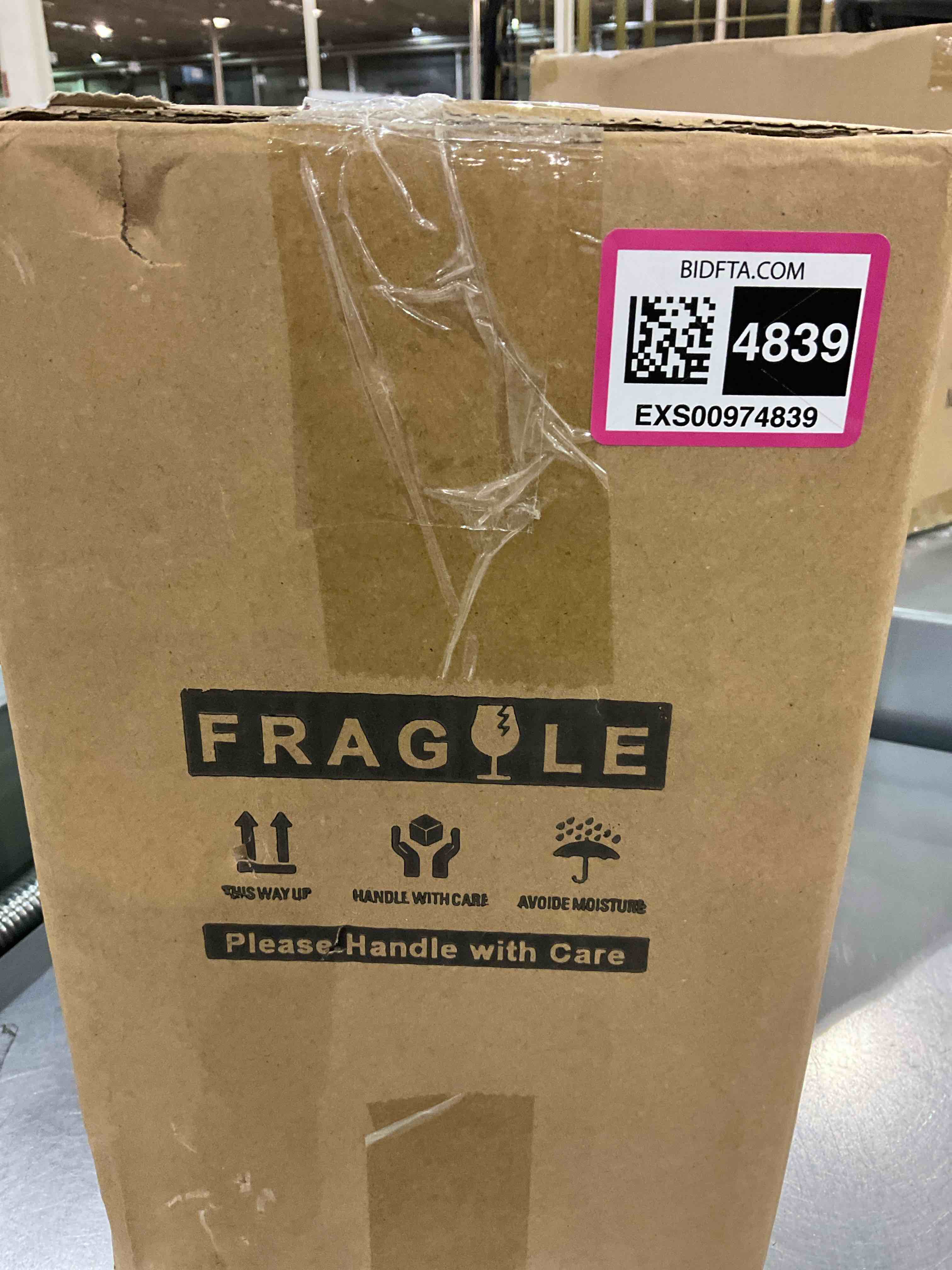 https://s3.amazonaws.com/lotting-images-prod/BargainHunt/EXS00974839_1710850631070.jpeg