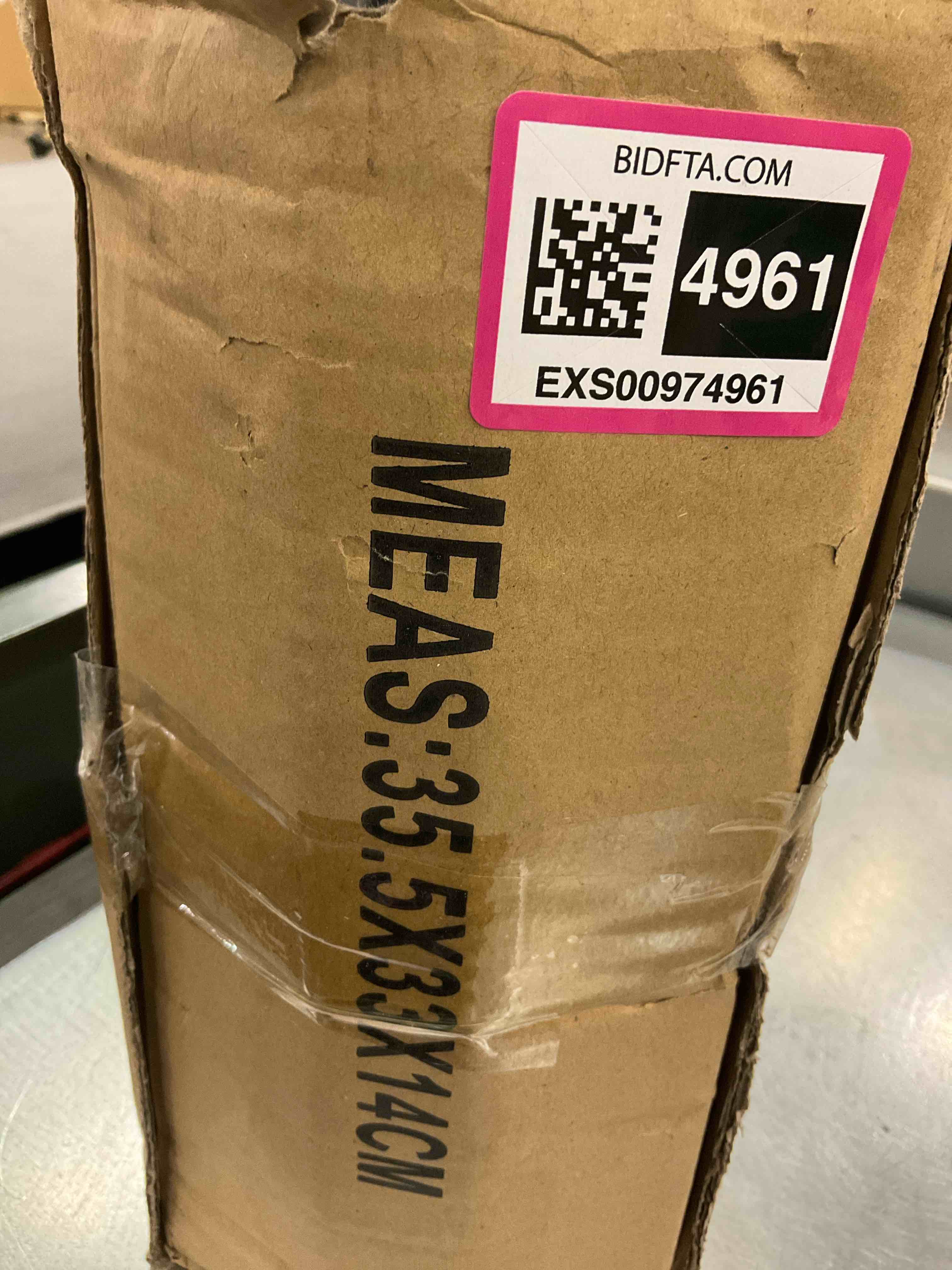https://s3.amazonaws.com/lotting-images-prod/BargainHunt/EXS00974961_1710874216653.jpeg