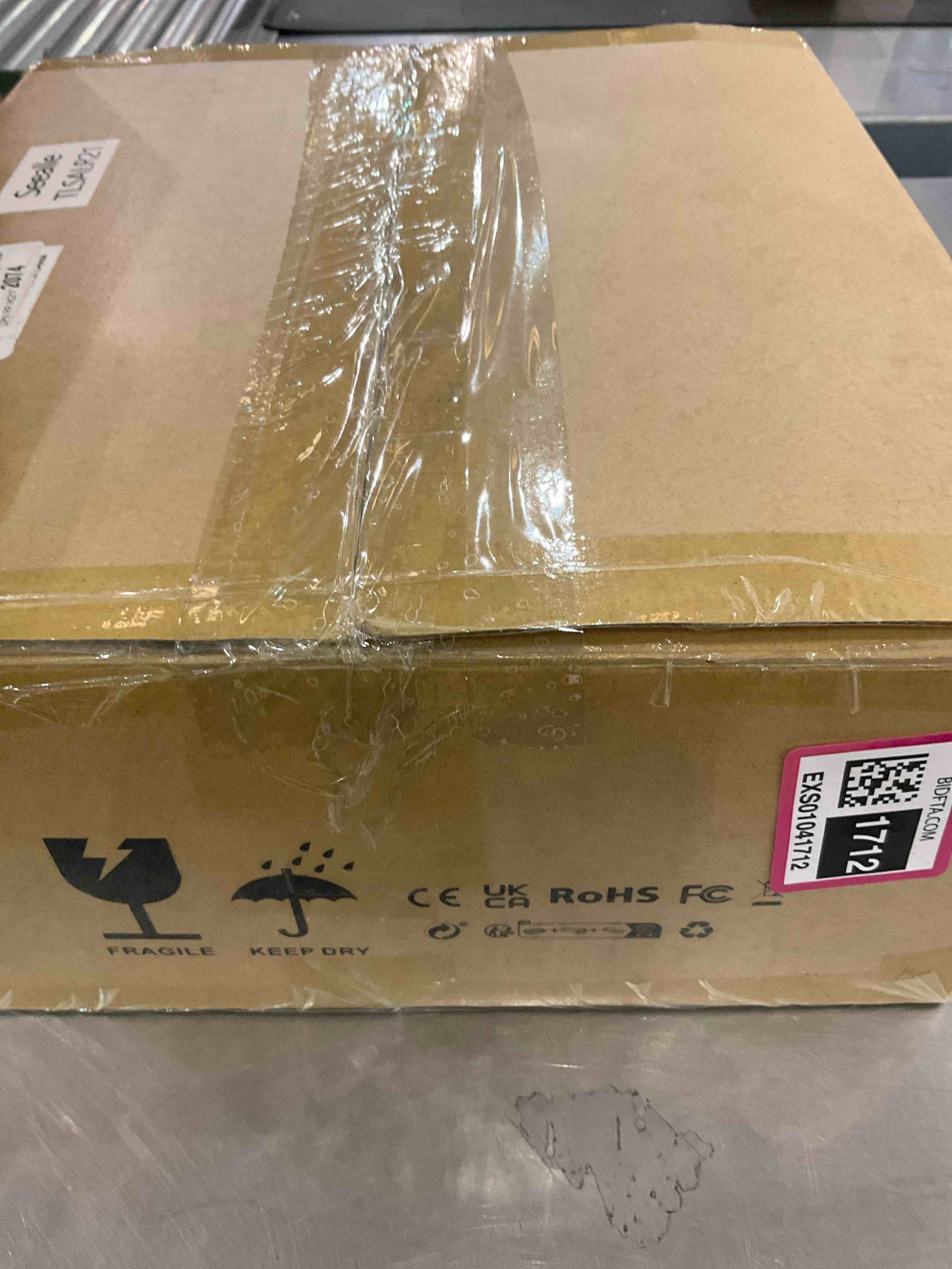 https://s3.amazonaws.com/lotting-images-prod/BargainHunt/EXS01041712_1708100404894.jpeg