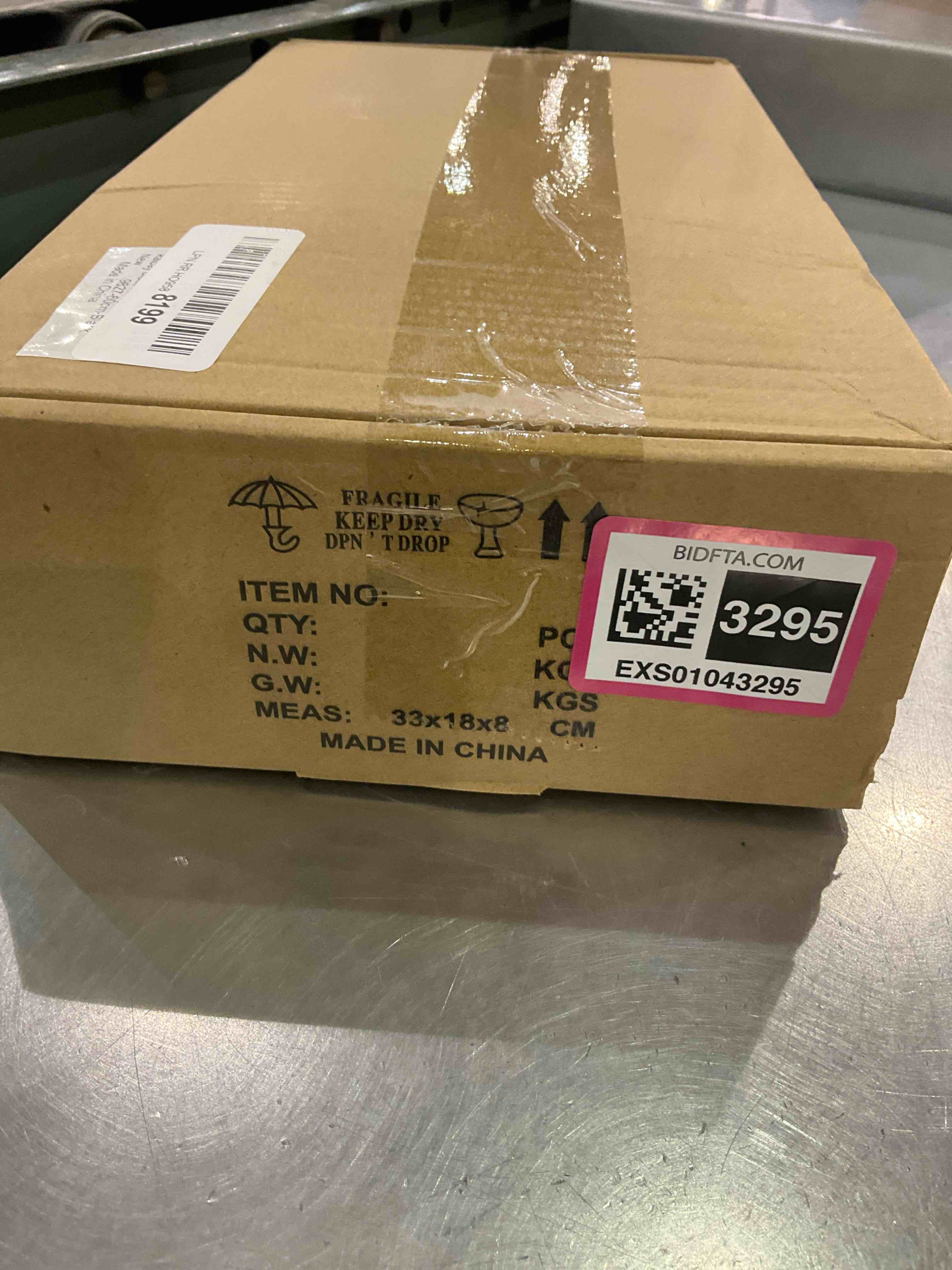 https://s3.amazonaws.com/lotting-images-prod/BargainHunt/EXS01043295_1708951865659.jpeg