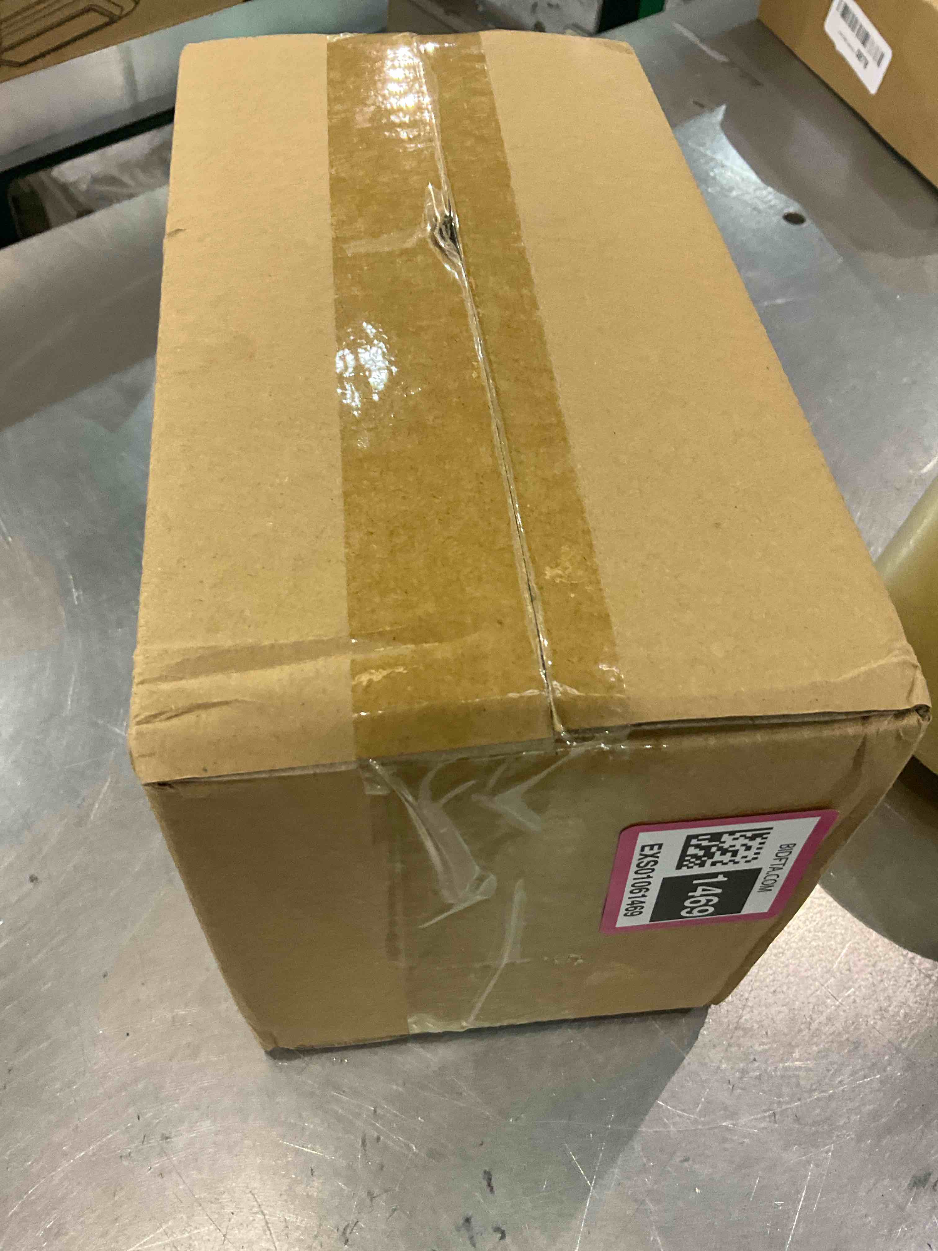 https://s3.amazonaws.com/lotting-images-prod/BargainHunt/EXS01061469_1707507893252.jpeg