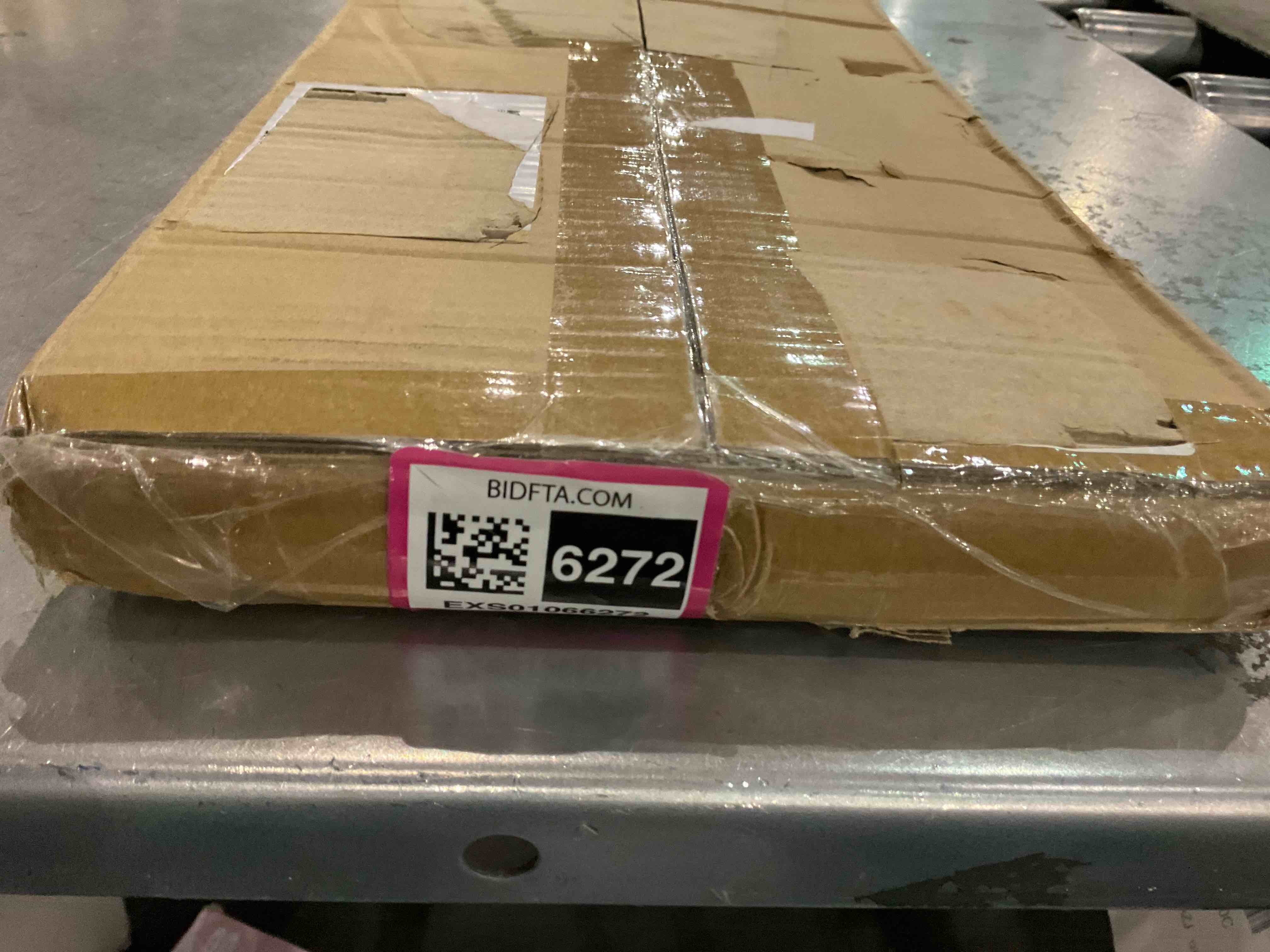 https://s3.amazonaws.com/lotting-images-prod/BargainHunt/EXS01066272_1707222858606.jpeg
