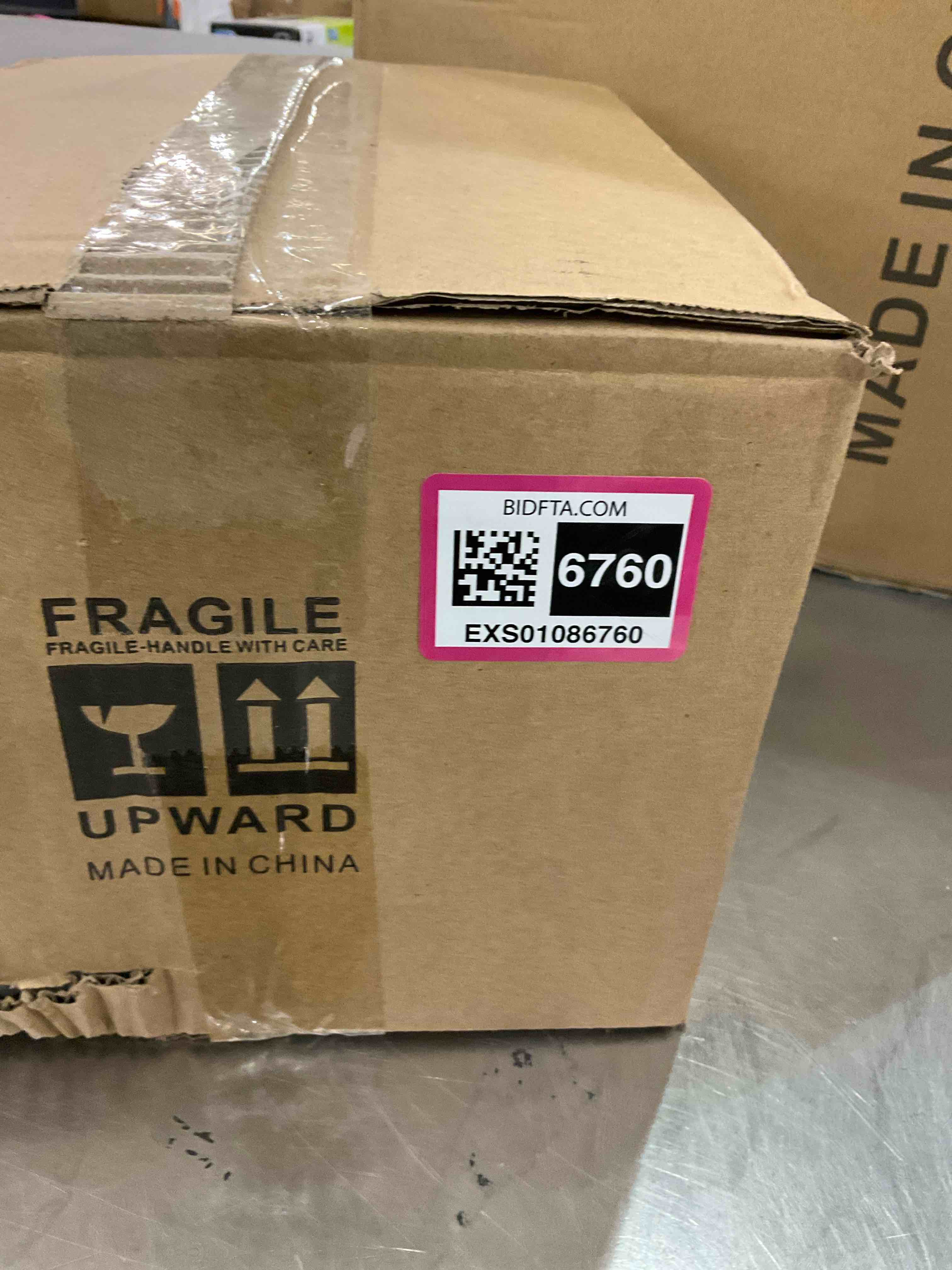 https://s3.amazonaws.com/lotting-images-prod/BargainHunt/EXS01086760_1708107493648.jpeg