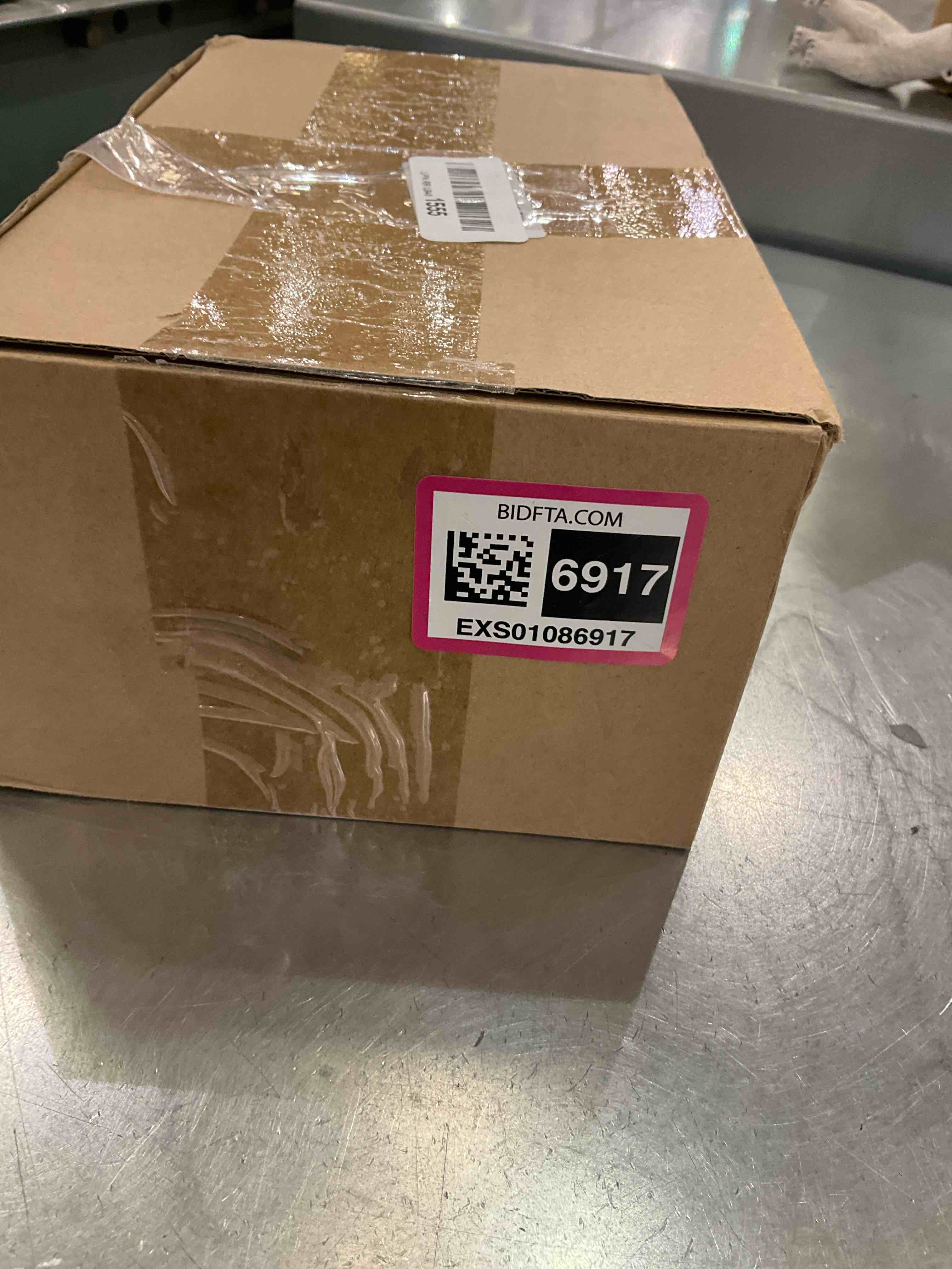 https://s3.amazonaws.com/lotting-images-prod/BargainHunt/EXS01086917_1708366626453.jpeg