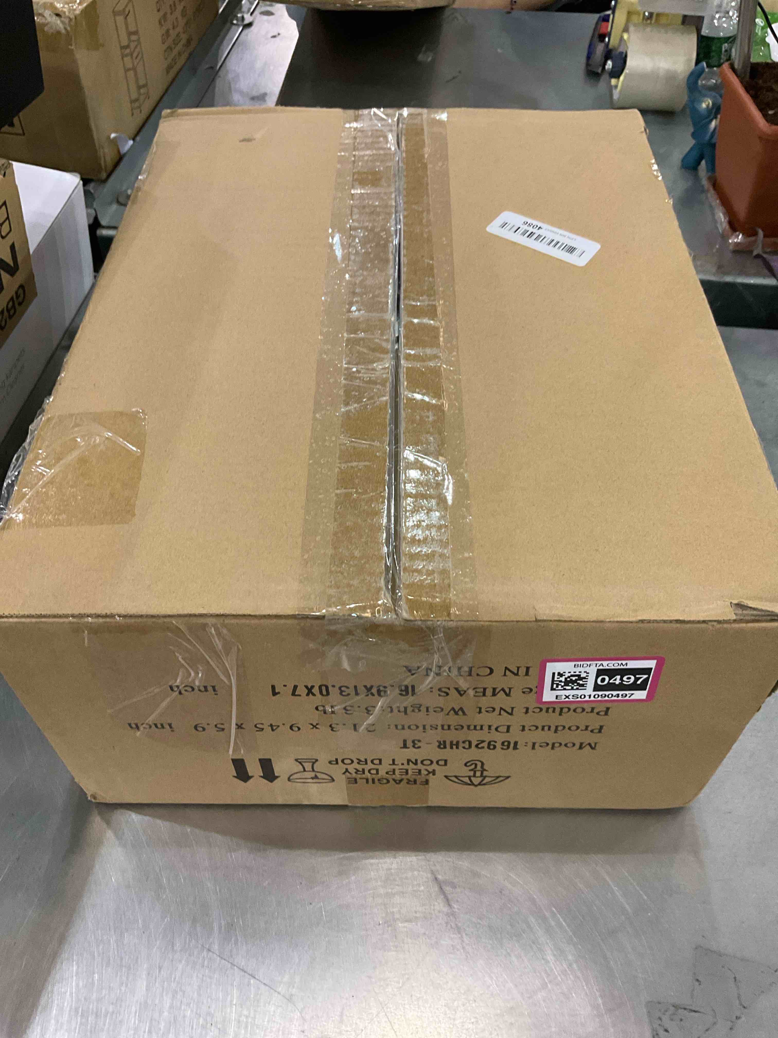 https://s3.amazonaws.com/lotting-images-prod/BargainHunt/EXS01090497_1708696035731.jpeg
