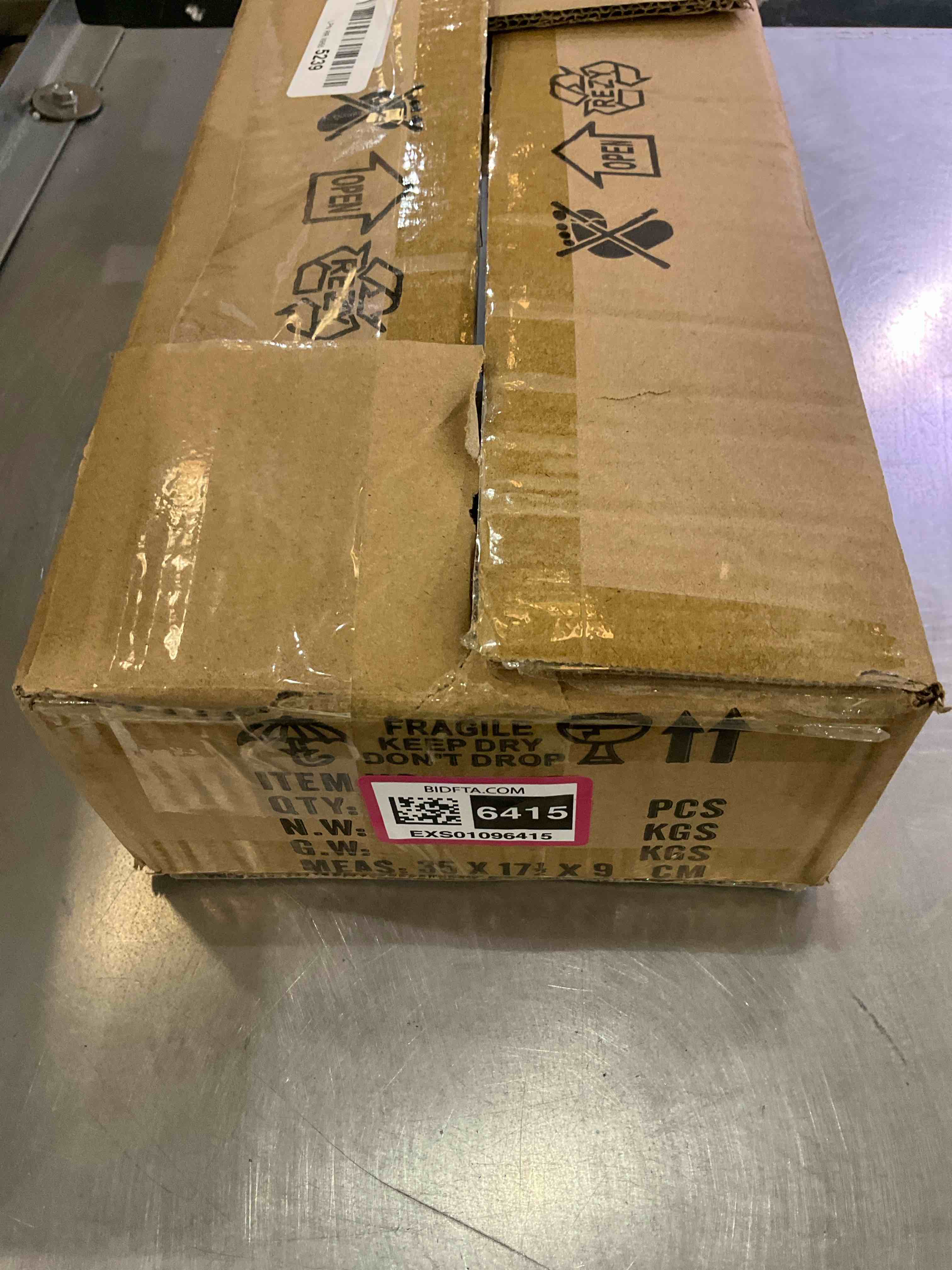 https://s3.amazonaws.com/lotting-images-prod/BargainHunt/EXS01096415_1708356143400.jpeg