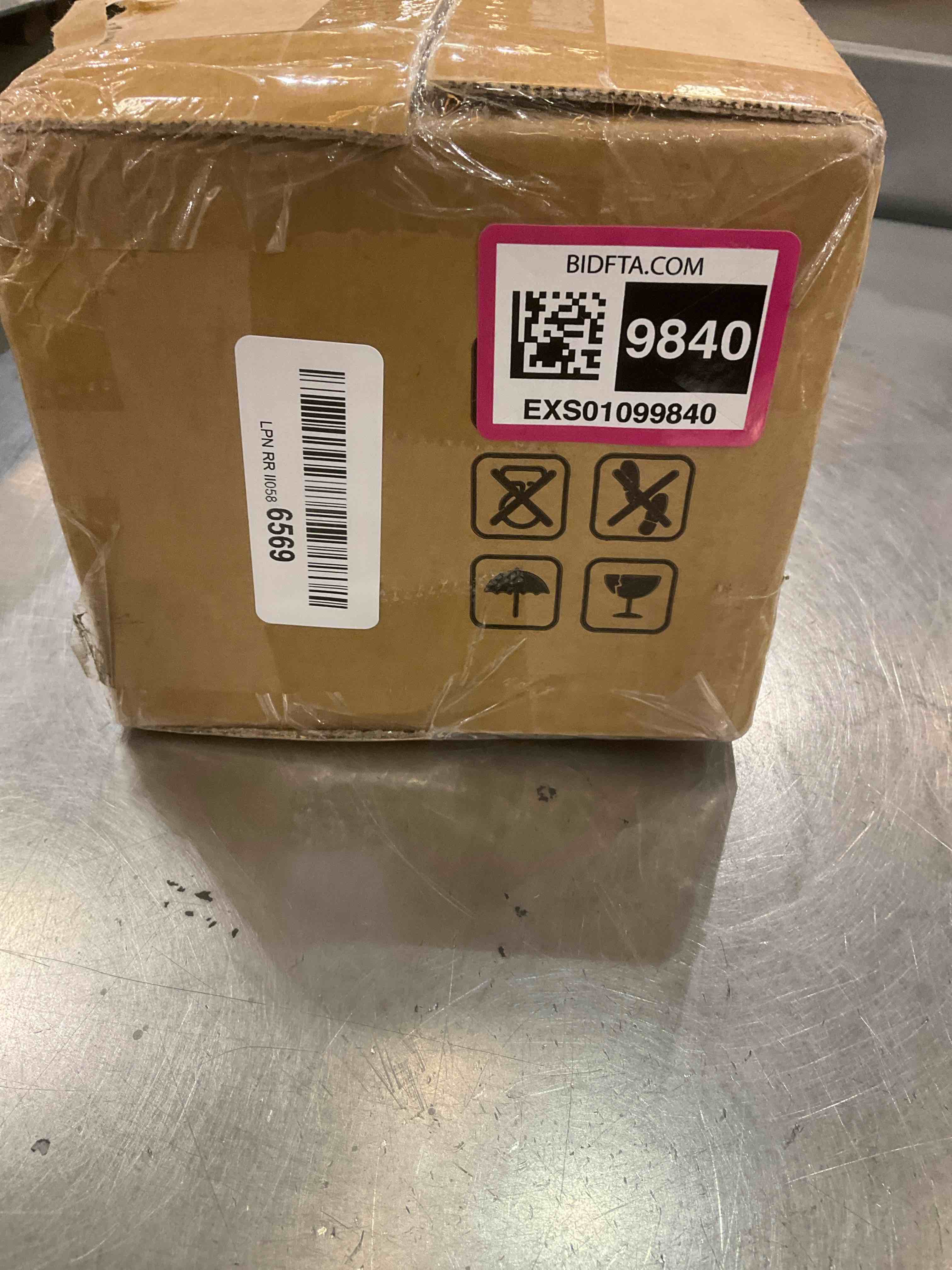 https://s3.amazonaws.com/lotting-images-prod/BargainHunt/EXS01099840_1708532715305.jpeg