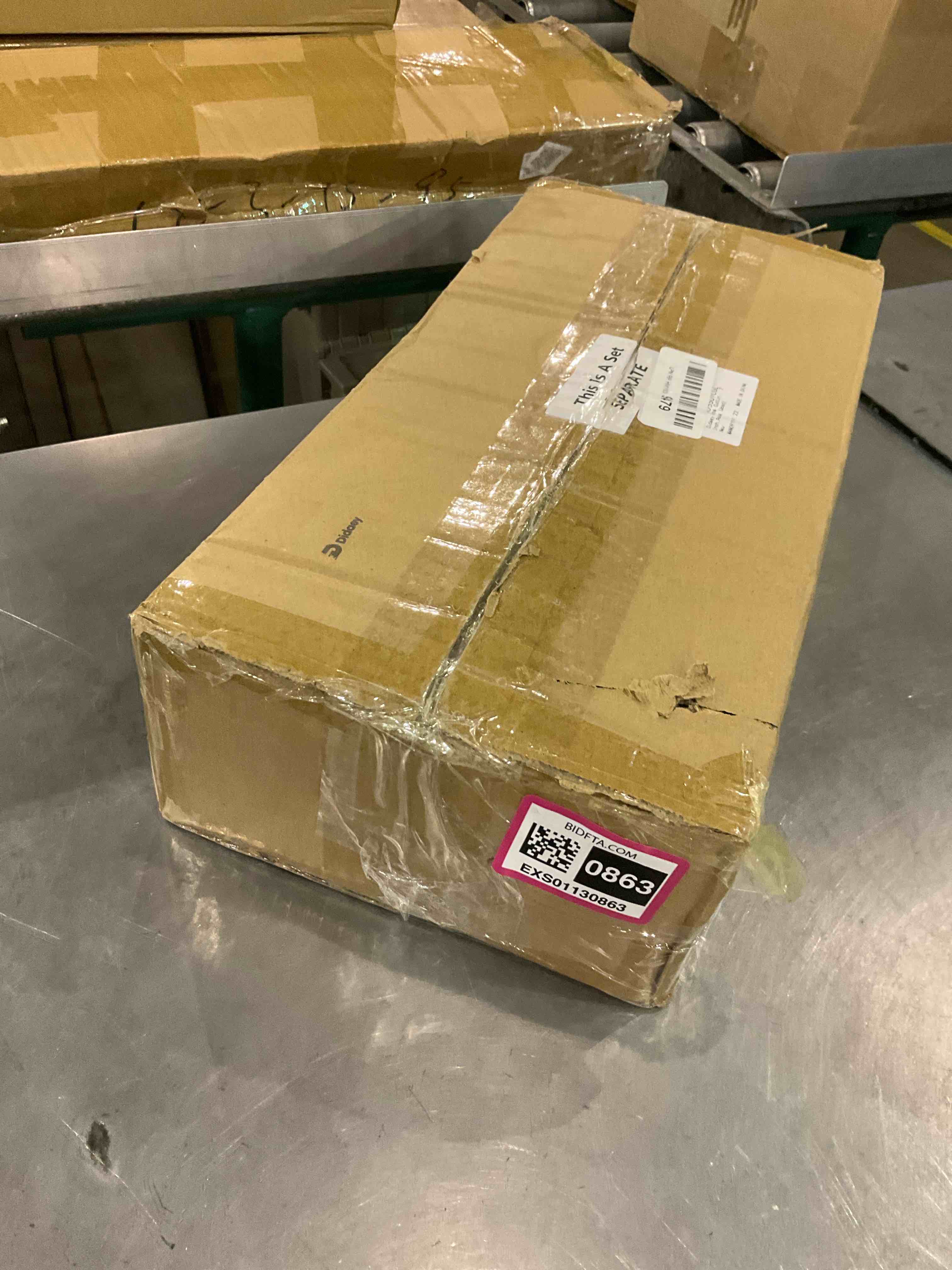 https://s3.amazonaws.com/lotting-images-prod/BargainHunt/EXS01130863_1707222705561.jpeg