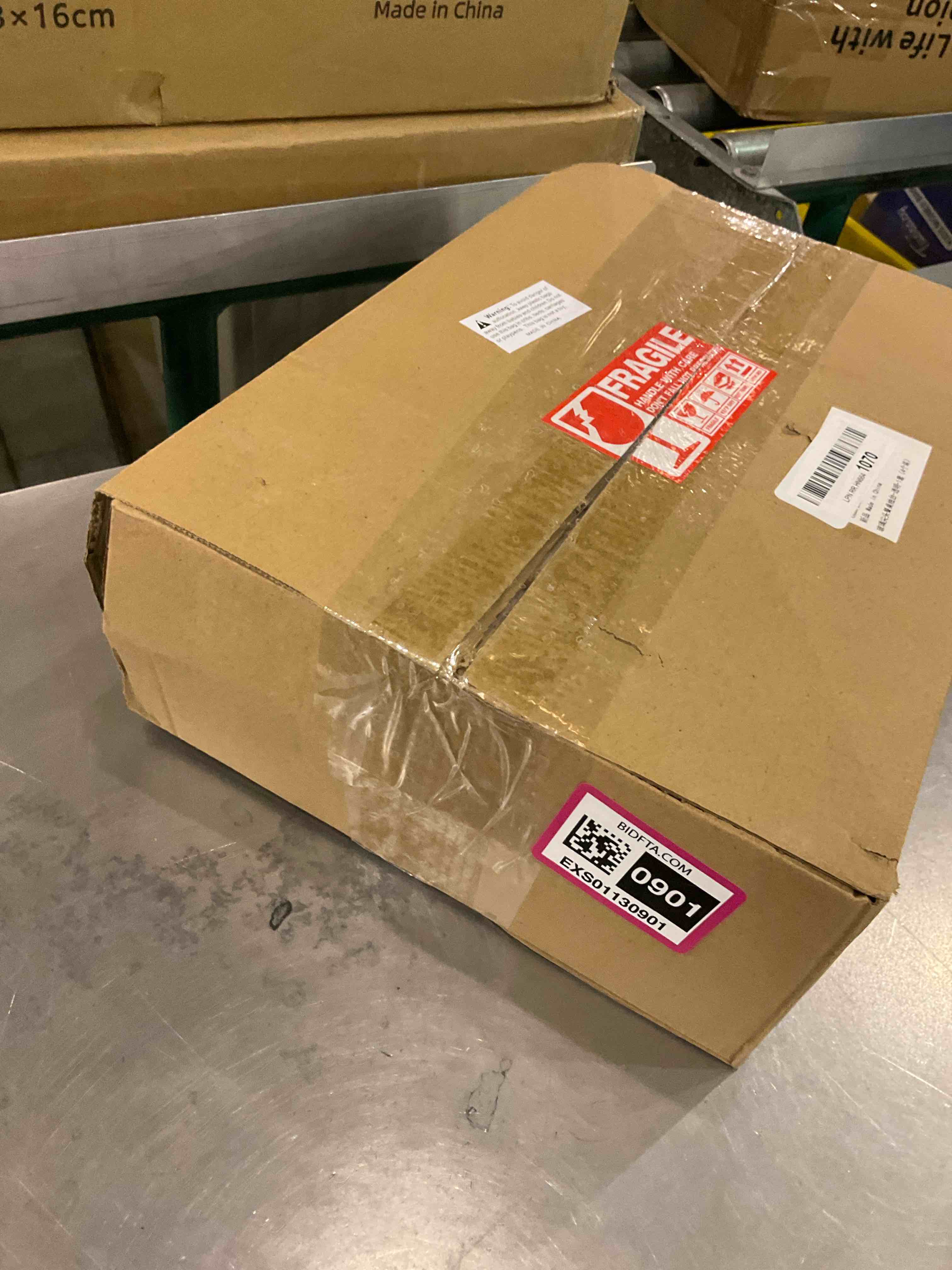 https://s3.amazonaws.com/lotting-images-prod/BargainHunt/EXS01130901_1707229852590.jpeg