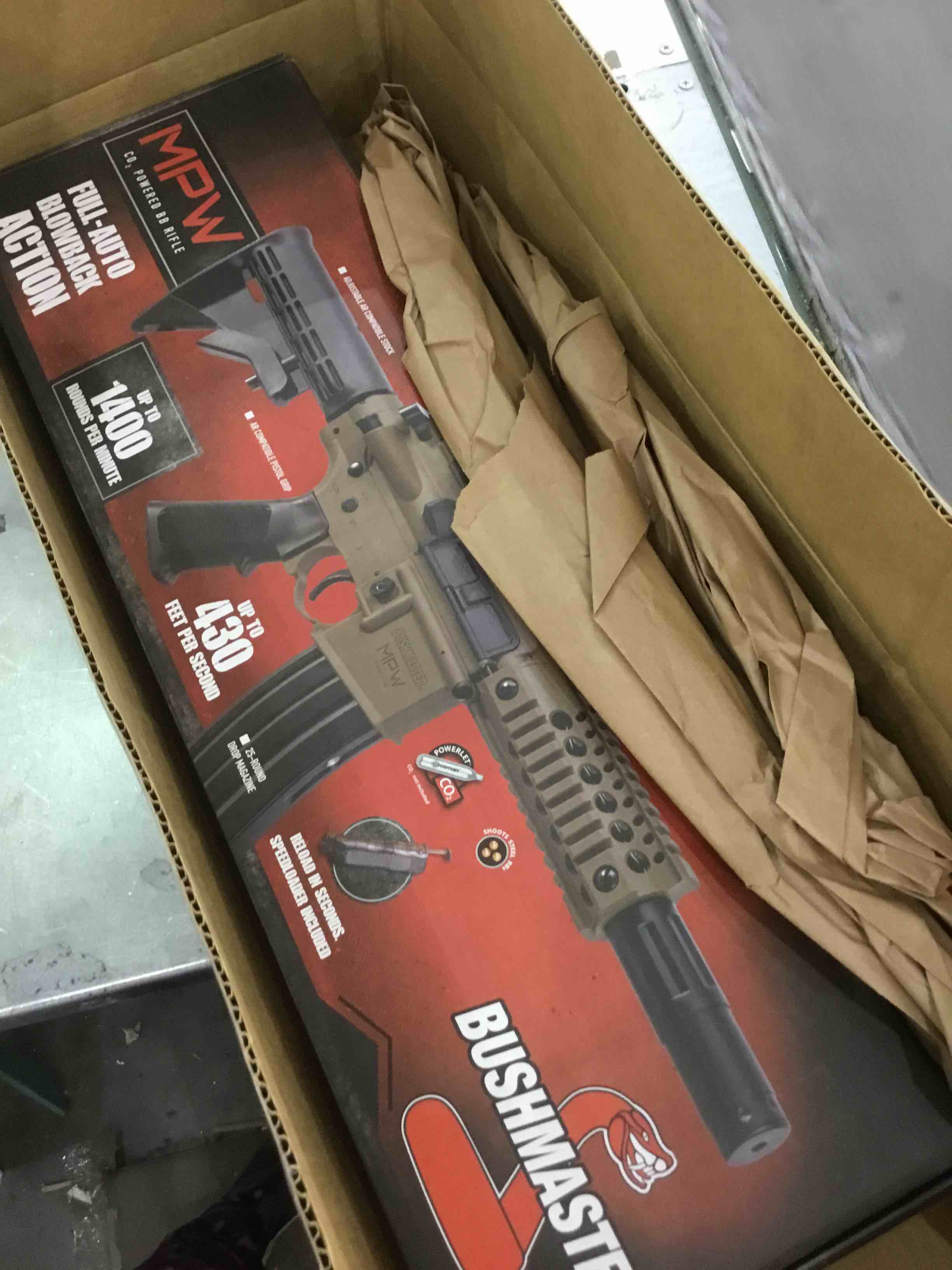 Bushmaster BMPWX Full Auto MPW CO2-Powered BB Air Rifle With Dual Action Capability And Red Dot Sight, Black/FDE