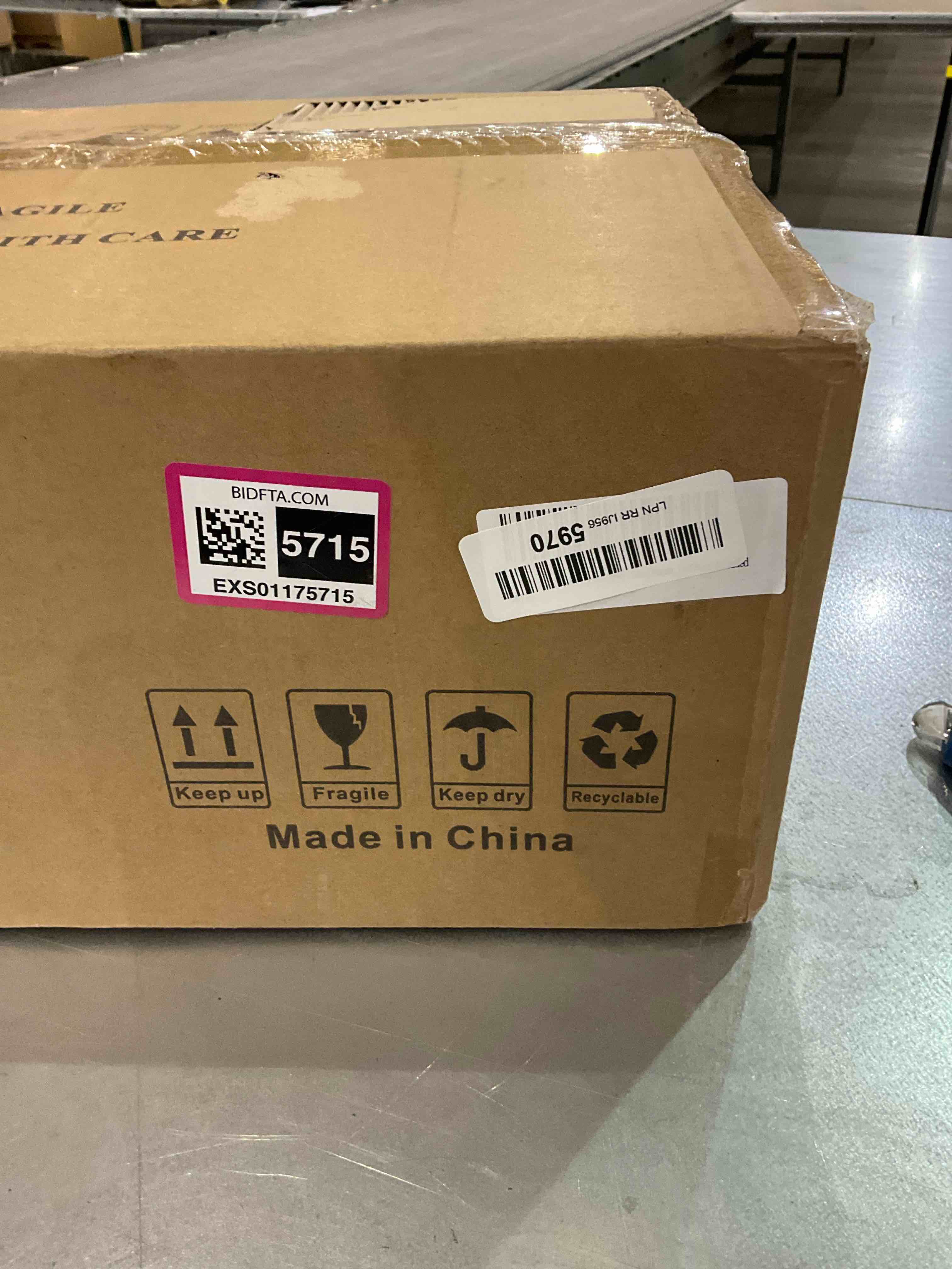 https://s3.amazonaws.com/lotting-images-prod/BargainHunt/EXS01175715_1709322718099.jpeg