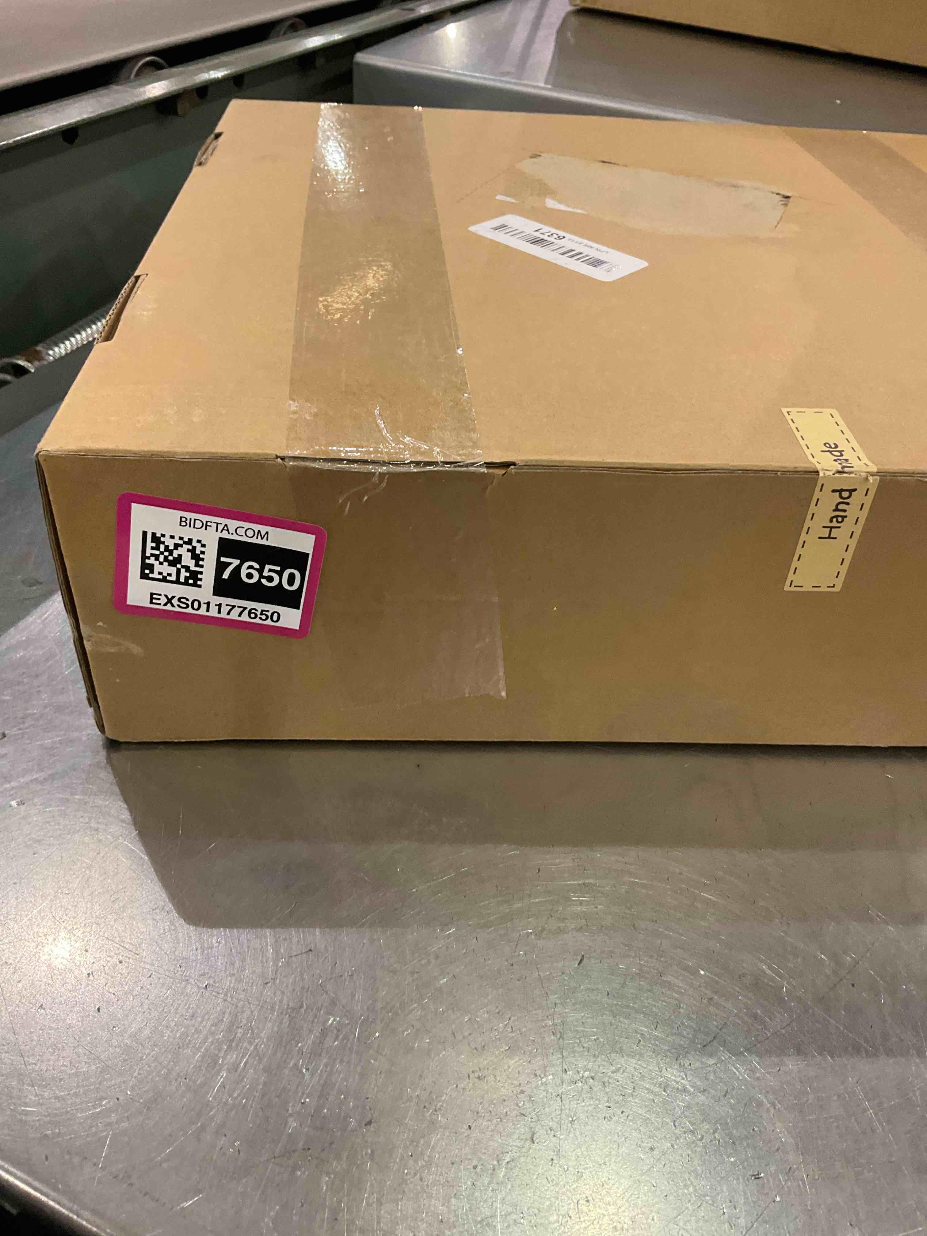 https://s3.amazonaws.com/lotting-images-prod/BargainHunt/EXS01177650_1709049814538.jpeg