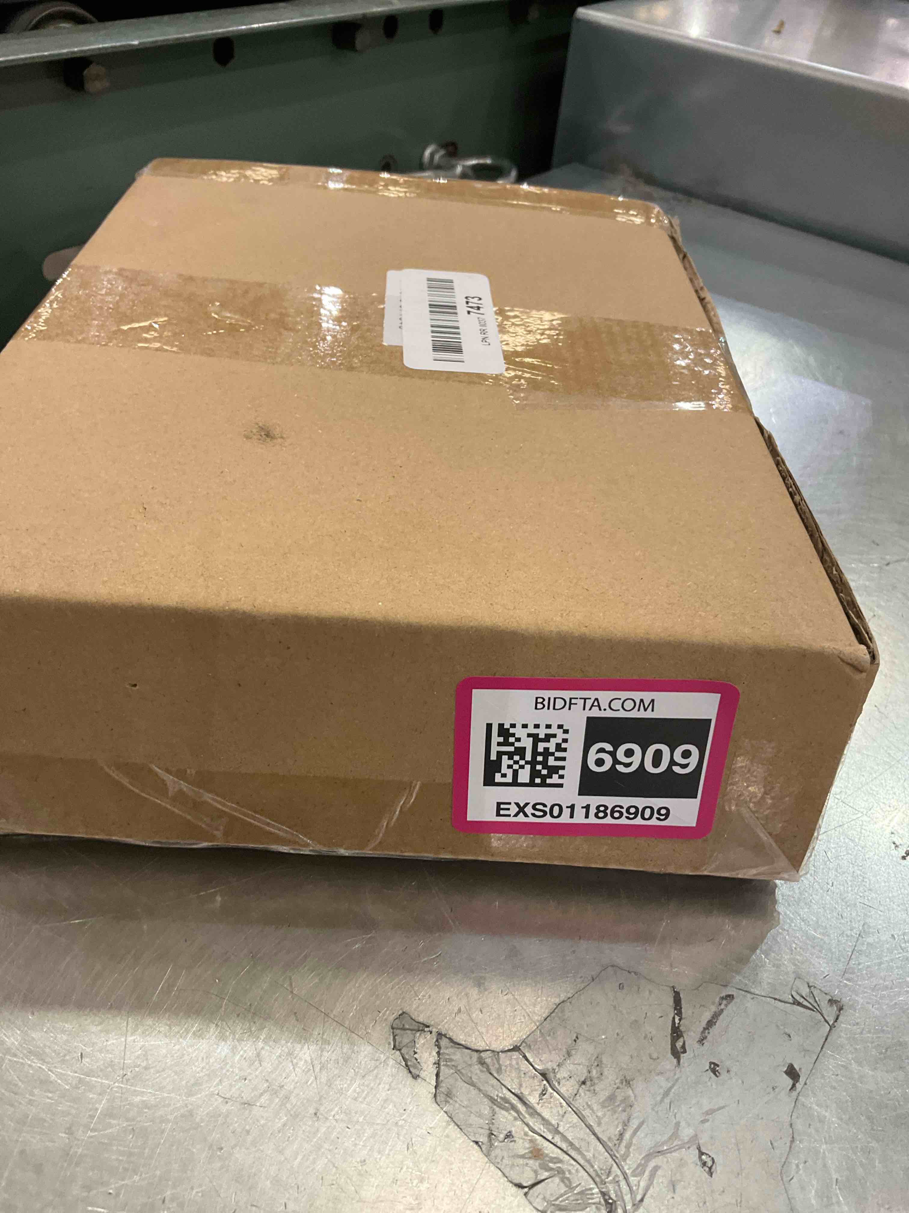 https://s3.amazonaws.com/lotting-images-prod/BargainHunt/EXS01186909_1709578426698.jpeg
