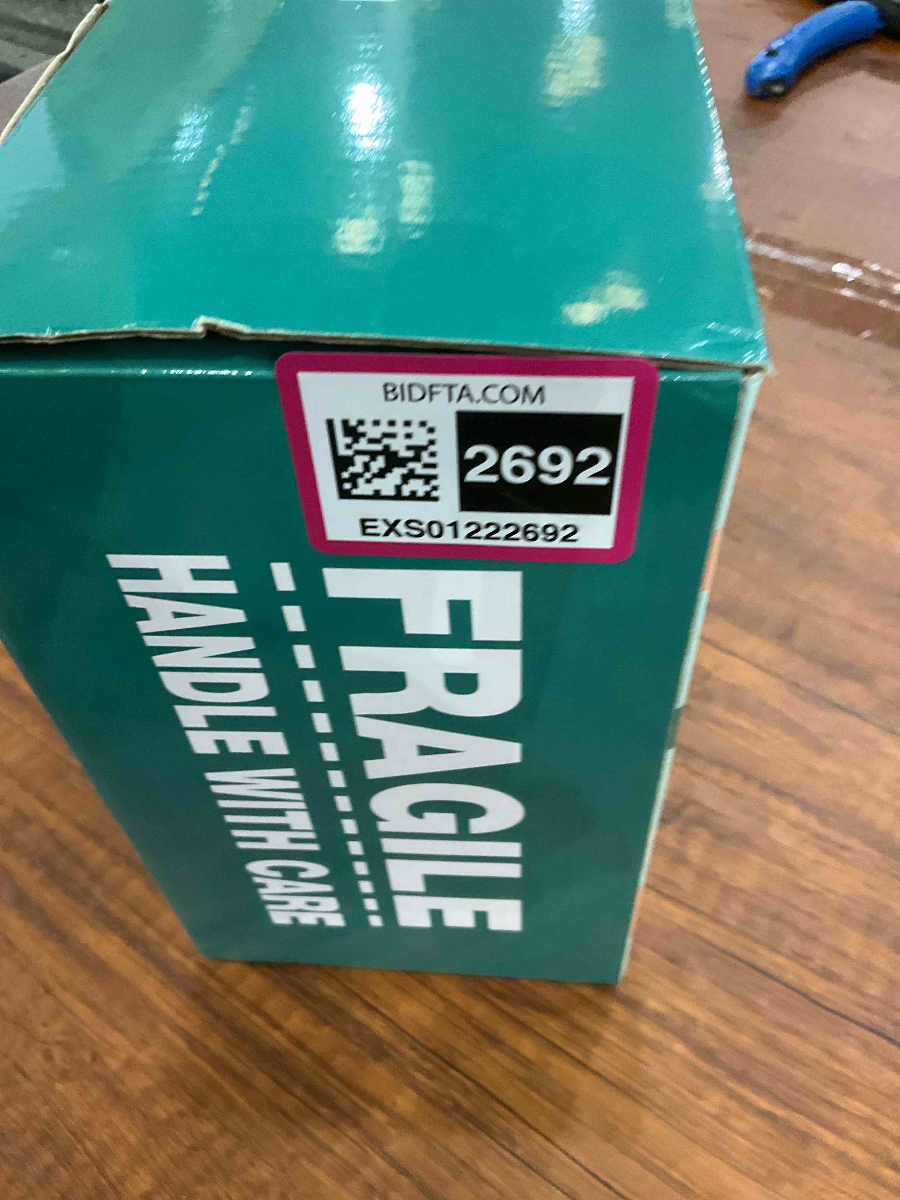 https://s3.amazonaws.com/lotting-images-prod/BargainHunt/EXS01222692_1712070602531.jpeg