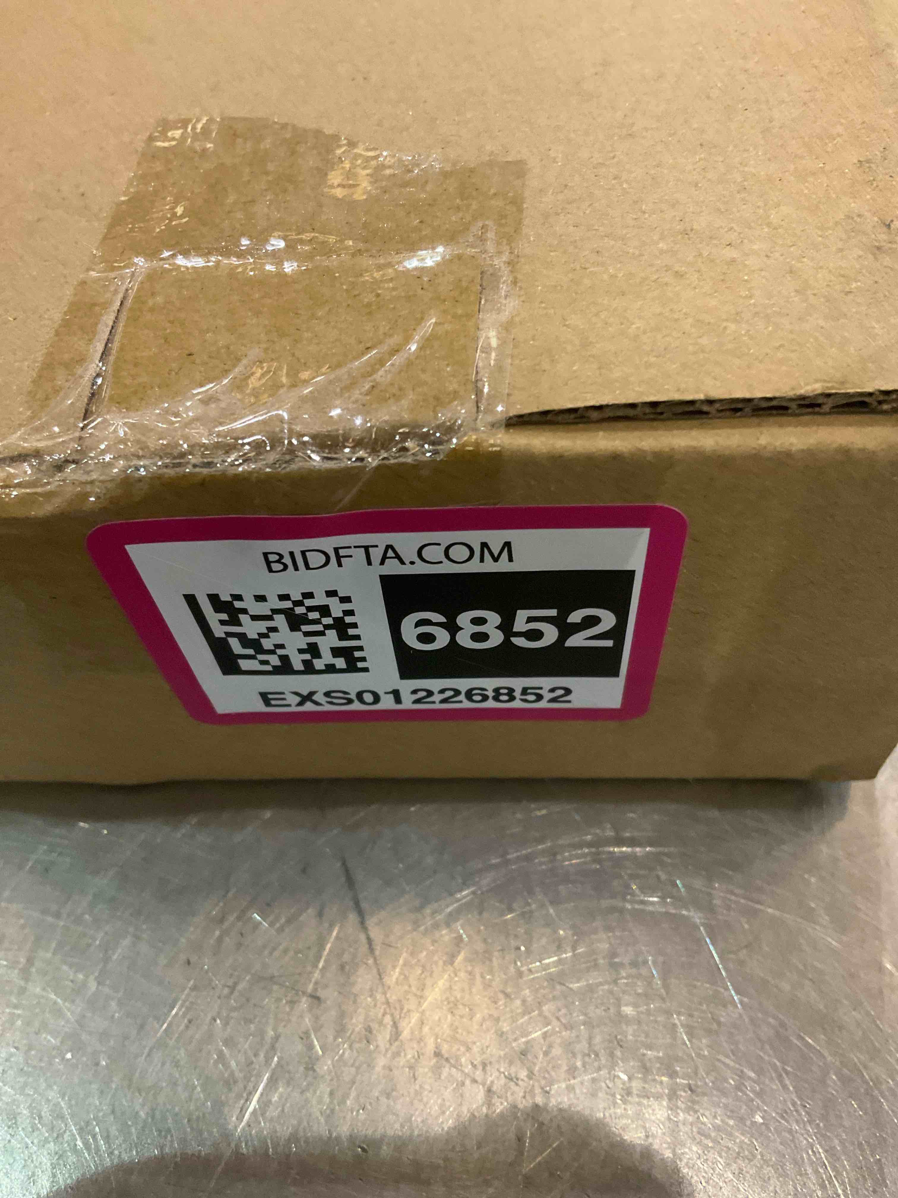 https://s3.amazonaws.com/lotting-images-prod/BargainHunt/EXS01226852_1710942602996.jpeg