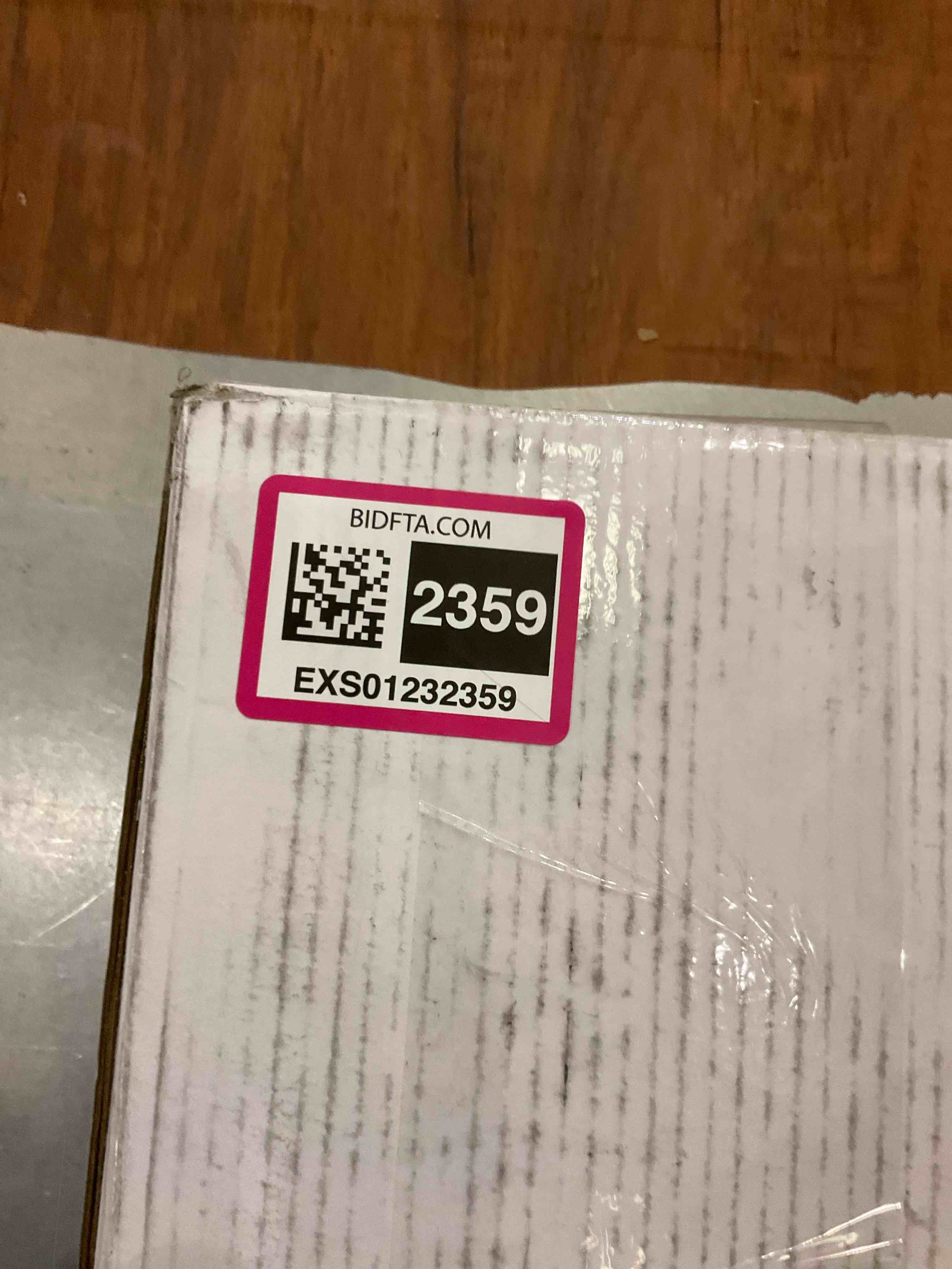 https://s3.amazonaws.com/lotting-images-prod/BargainHunt/EXS01232359_1712686963564.jpeg