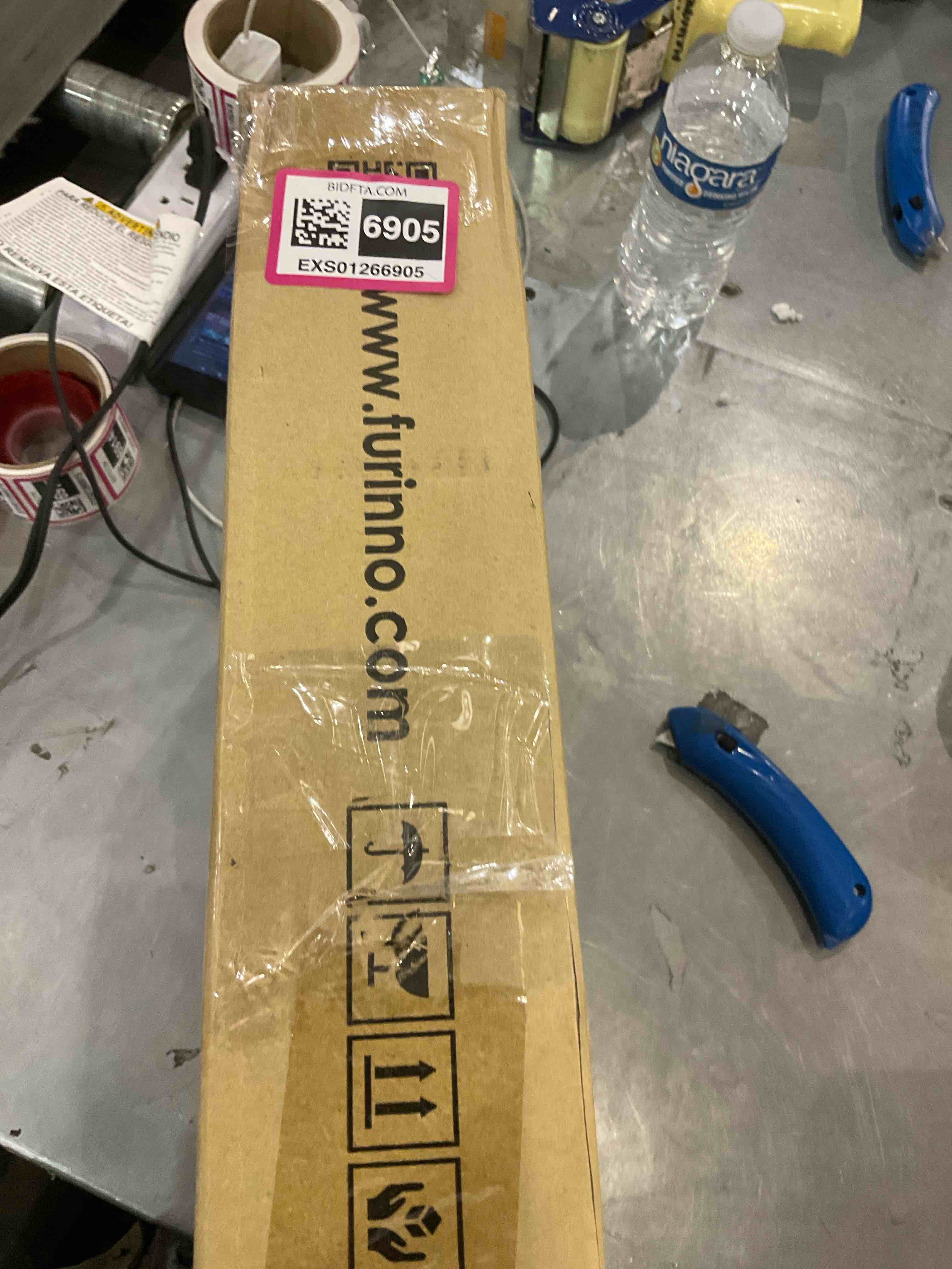 https://s3.amazonaws.com/lotting-images-prod/BargainHunt/EXS01266905_1709817862359.jpeg