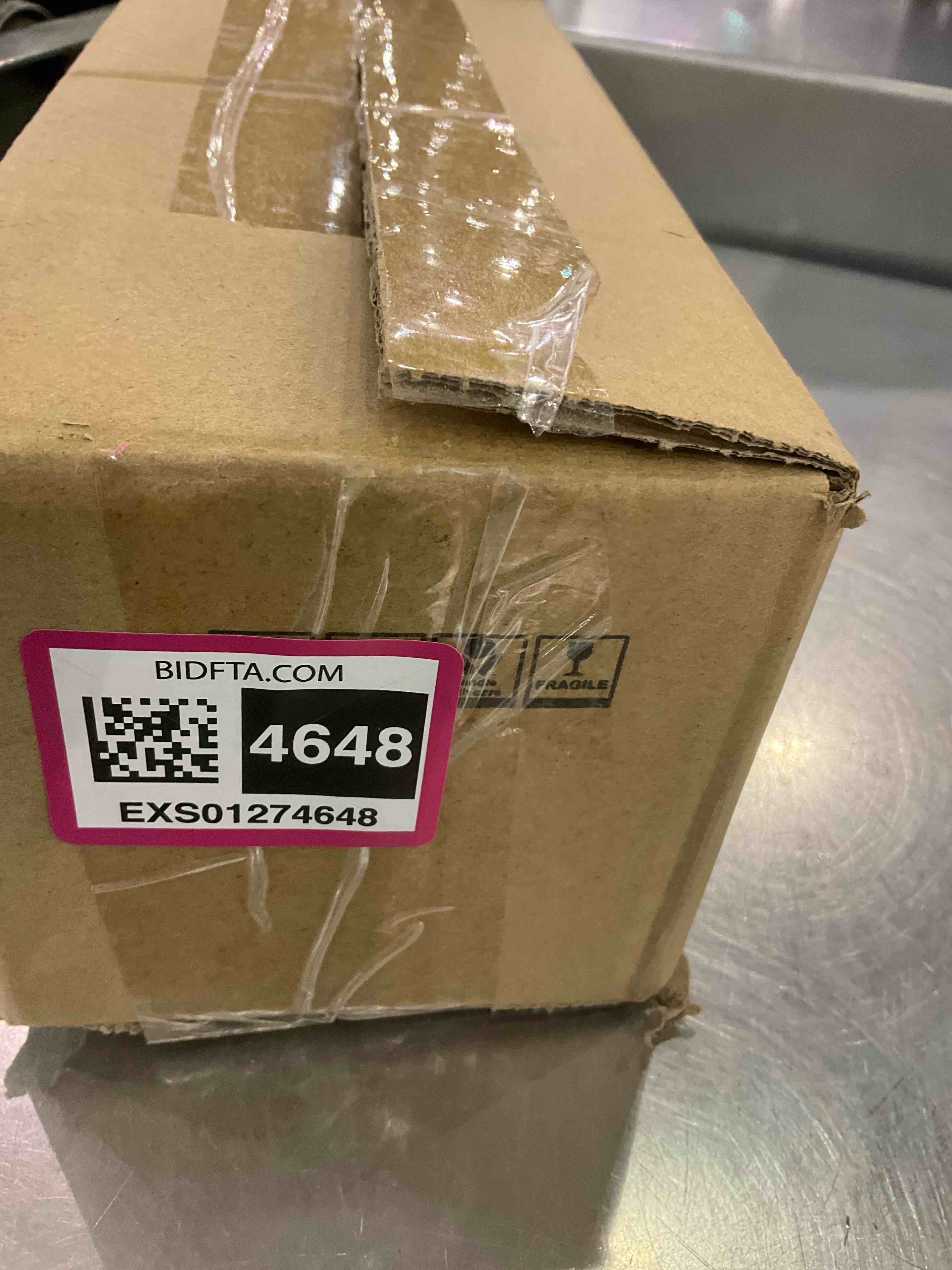 https://s3.amazonaws.com/lotting-images-prod/BargainHunt/EXS01274648_1711626397305.jpeg