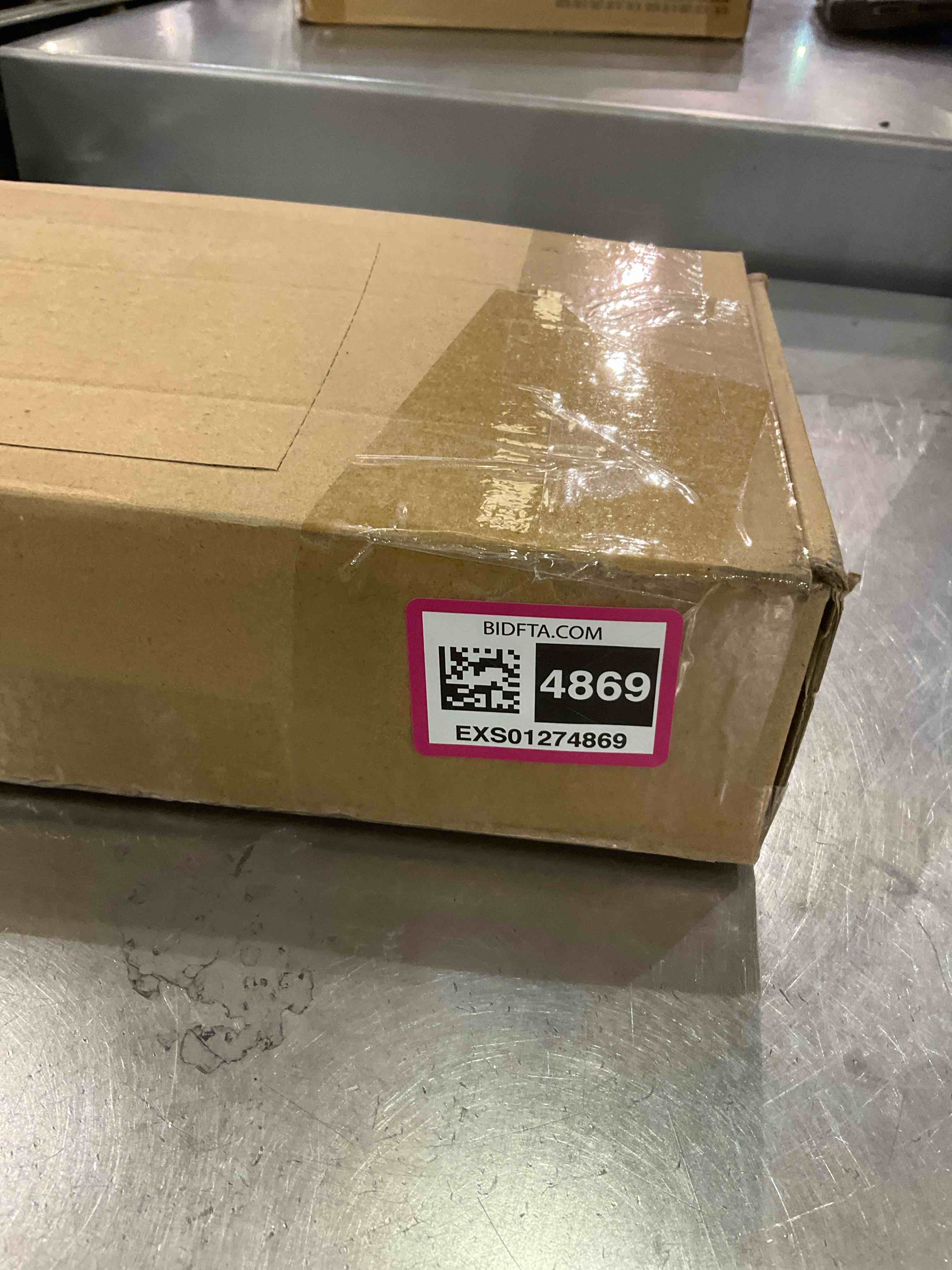 https://s3.amazonaws.com/lotting-images-prod/BargainHunt/EXS01274869_1711716198670.jpeg