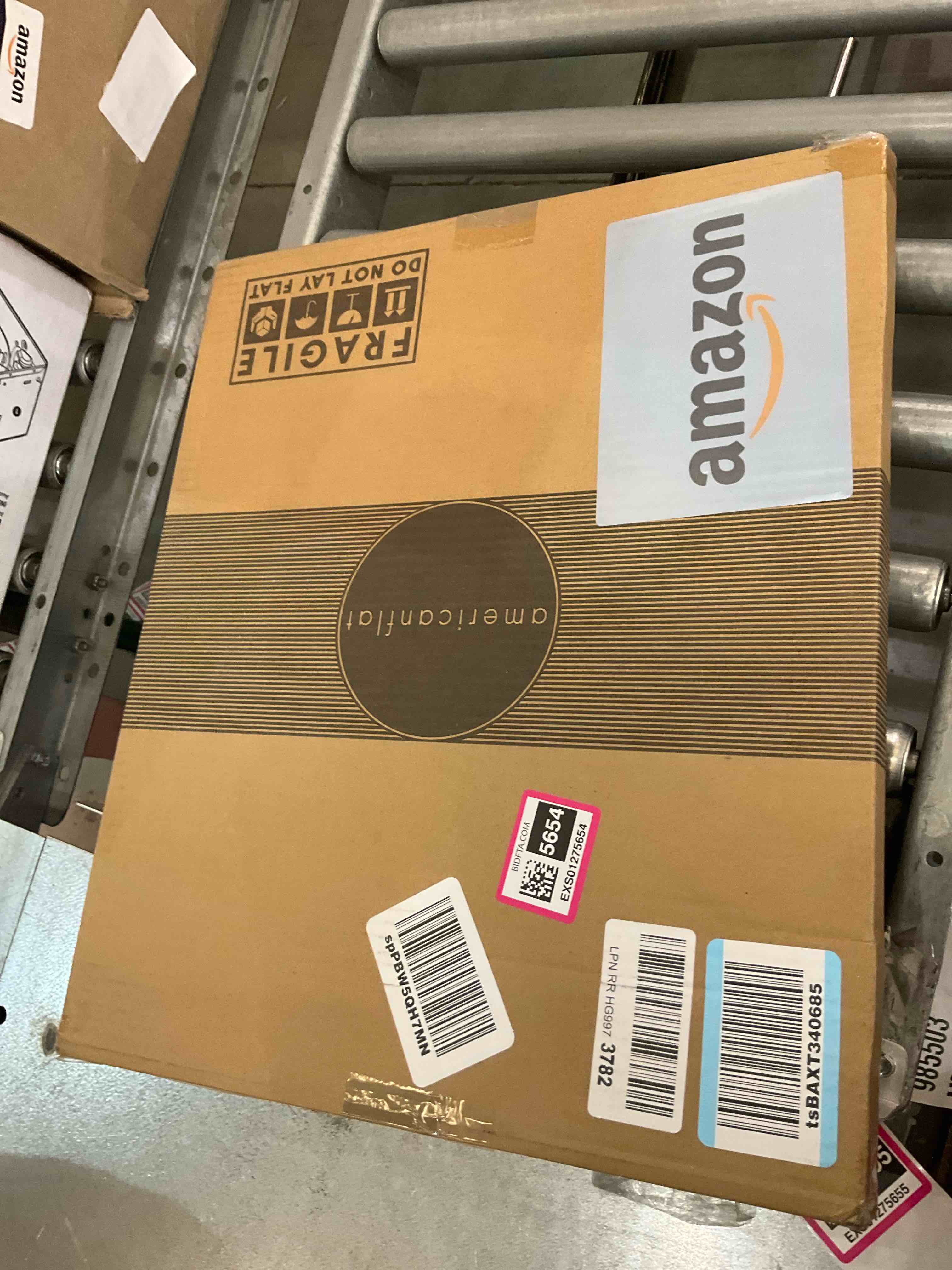 https://s3.amazonaws.com/lotting-images-prod/BargainHunt/EXS01275654_1711734574190.jpeg