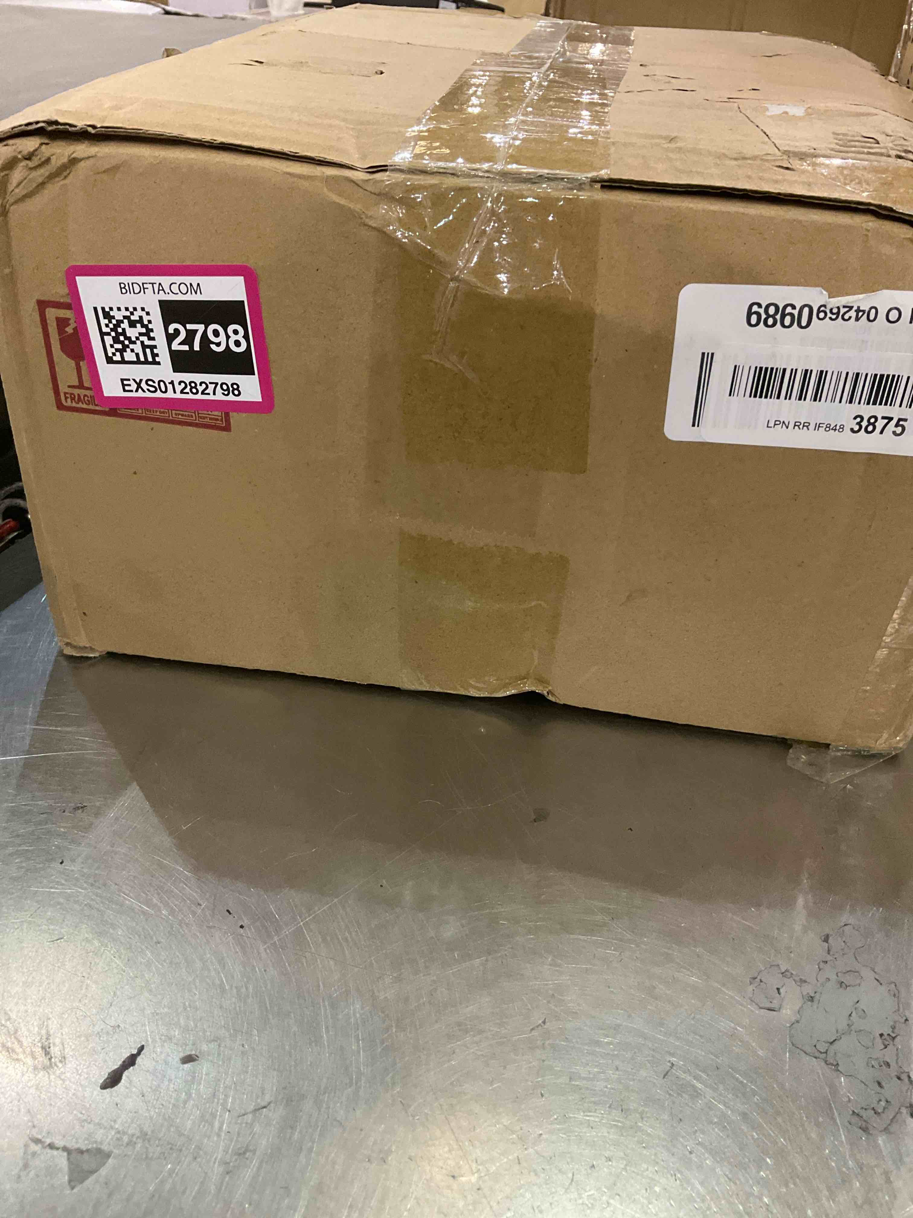 https://s3.amazonaws.com/lotting-images-prod/BargainHunt/EXS01282798_1712245477802.jpeg