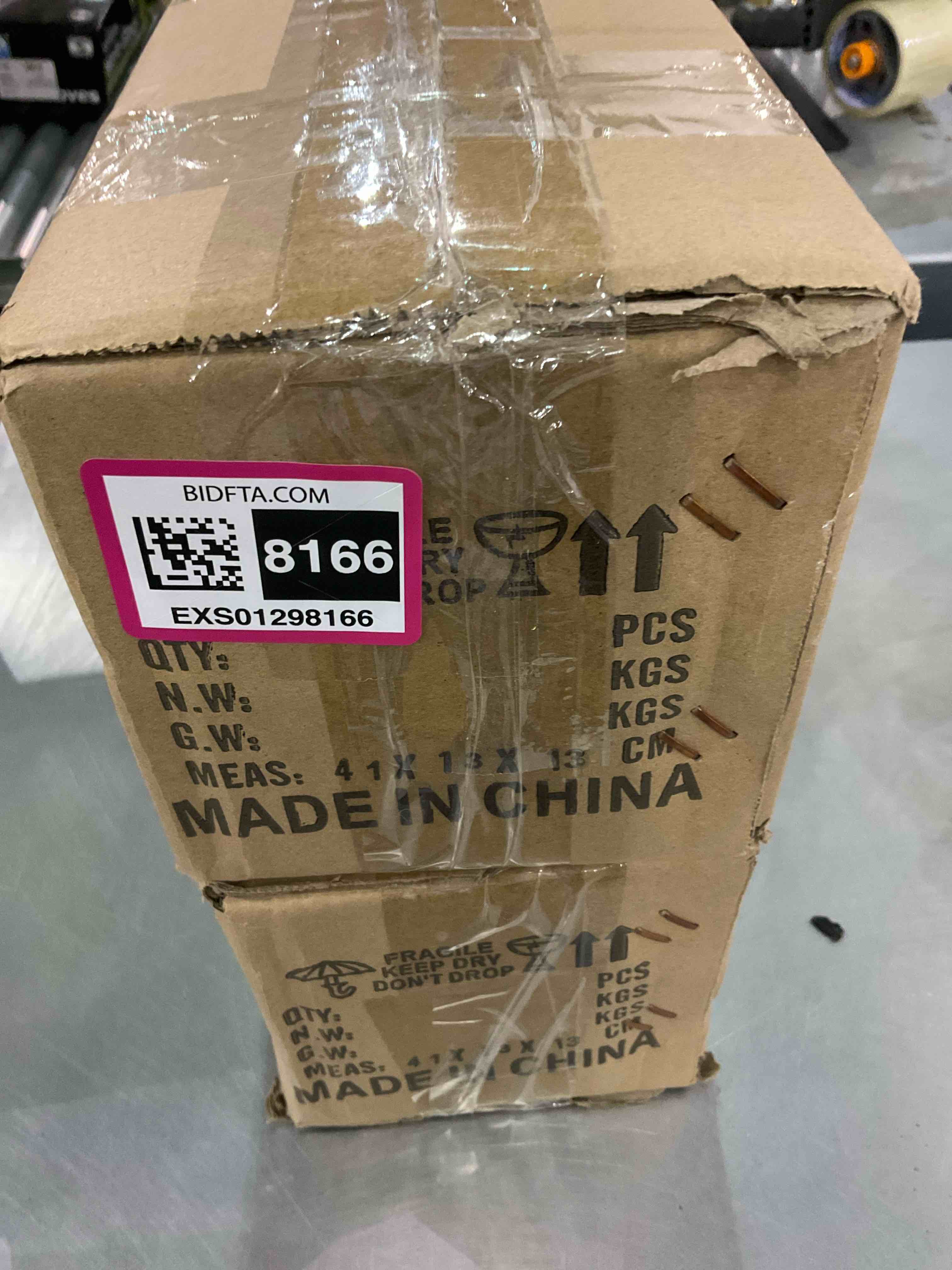 https://s3.amazonaws.com/lotting-images-prod/BargainHunt/EXS01298166_1712748277516.jpeg