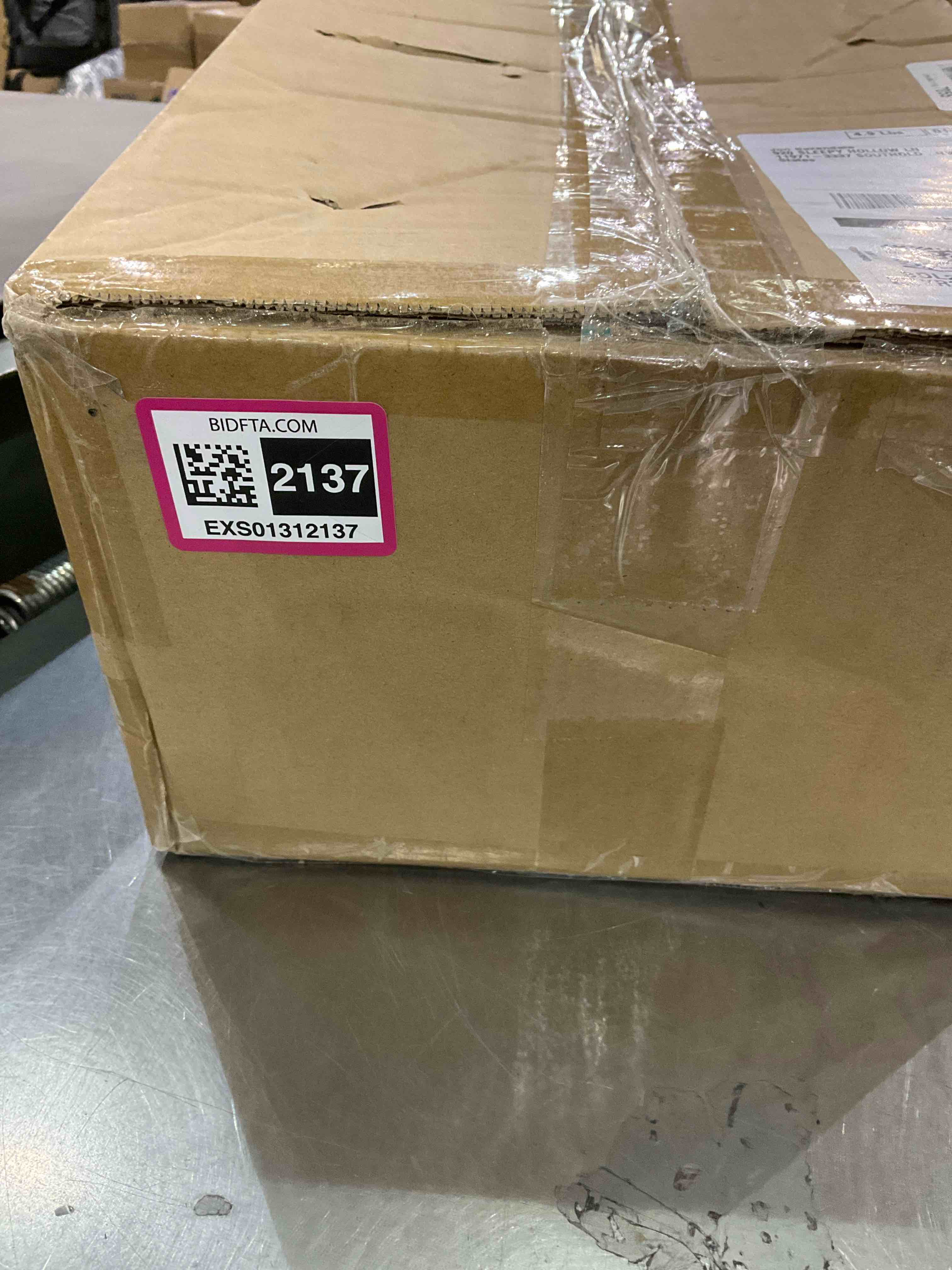 https://s3.amazonaws.com/lotting-images-prod/BargainHunt/EXS01312137_1710337980565.jpeg