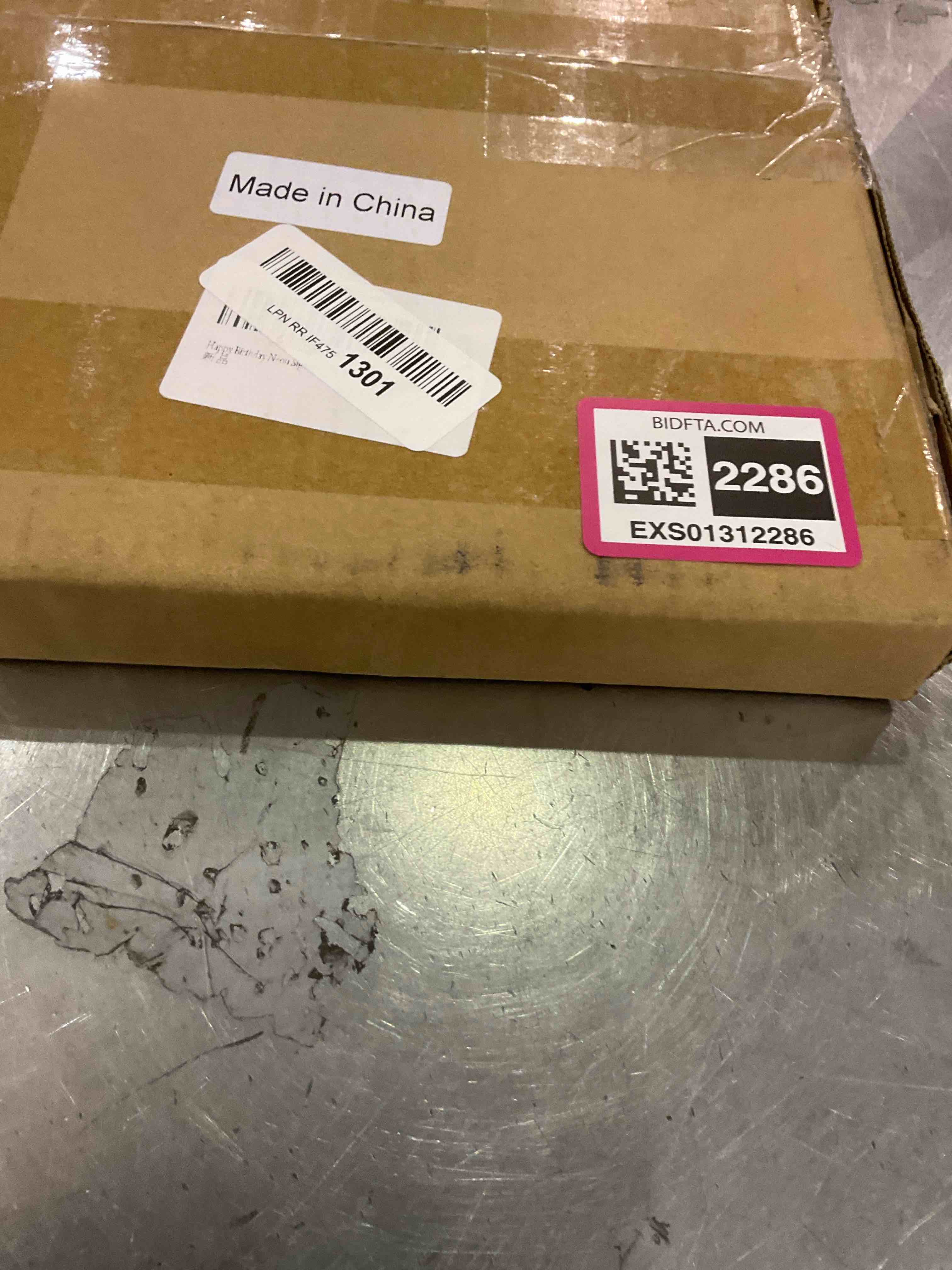 https://s3.amazonaws.com/lotting-images-prod/BargainHunt/EXS01312286_1710417267508.jpeg