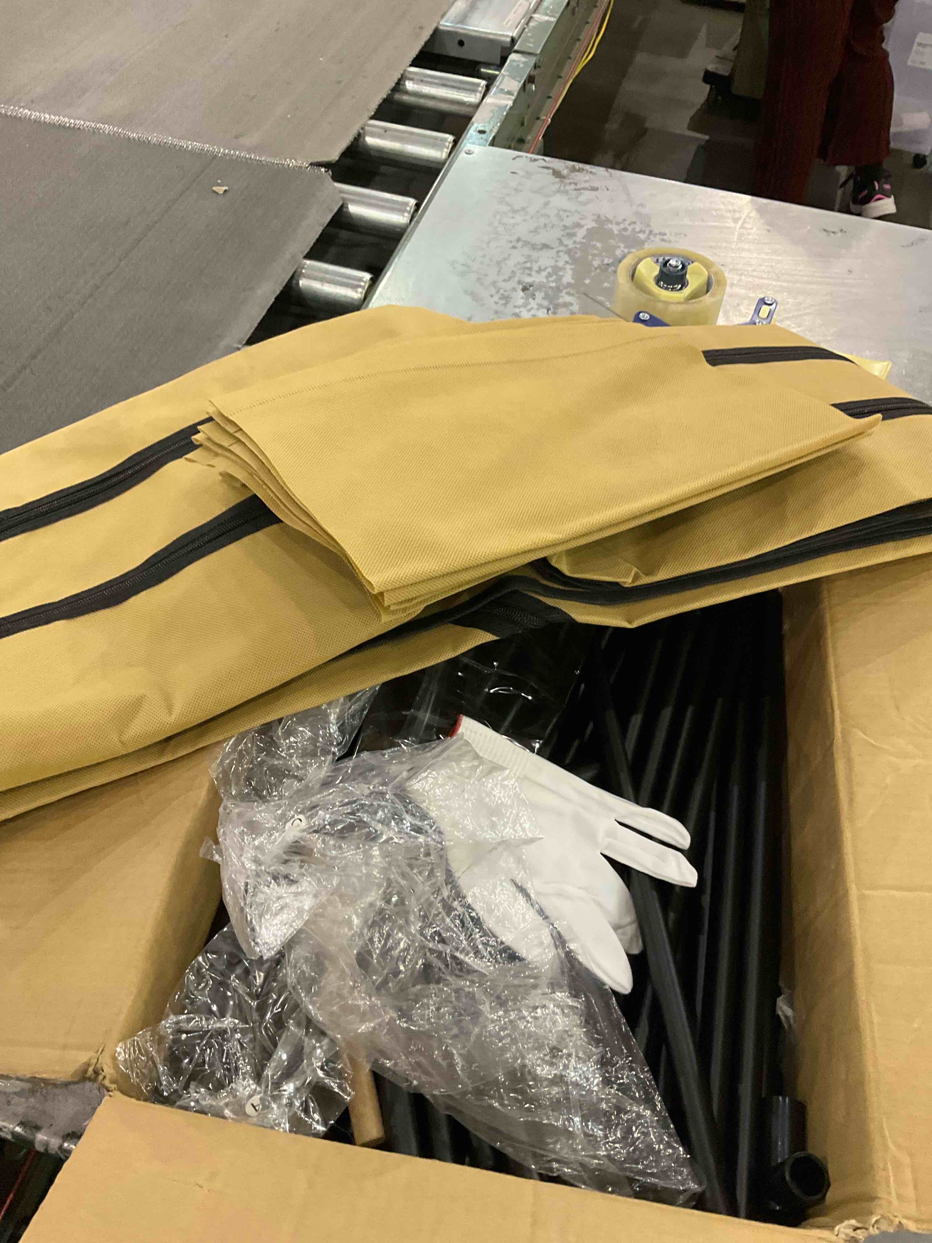 standing rack with laundry basket on bottom 