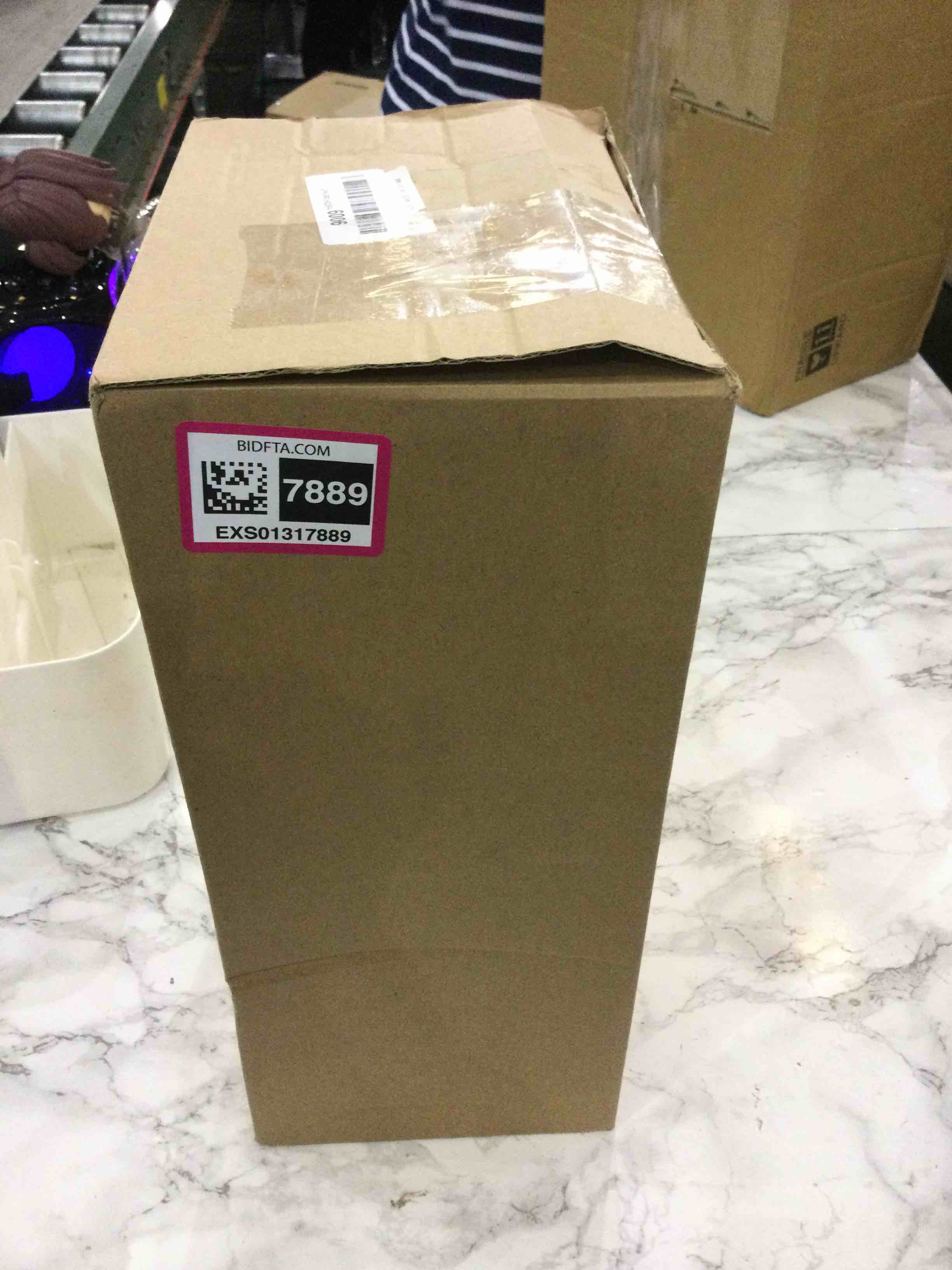 https://s3.amazonaws.com/lotting-images-prod/BargainHunt/EXS01317889_1711377245663.jpeg