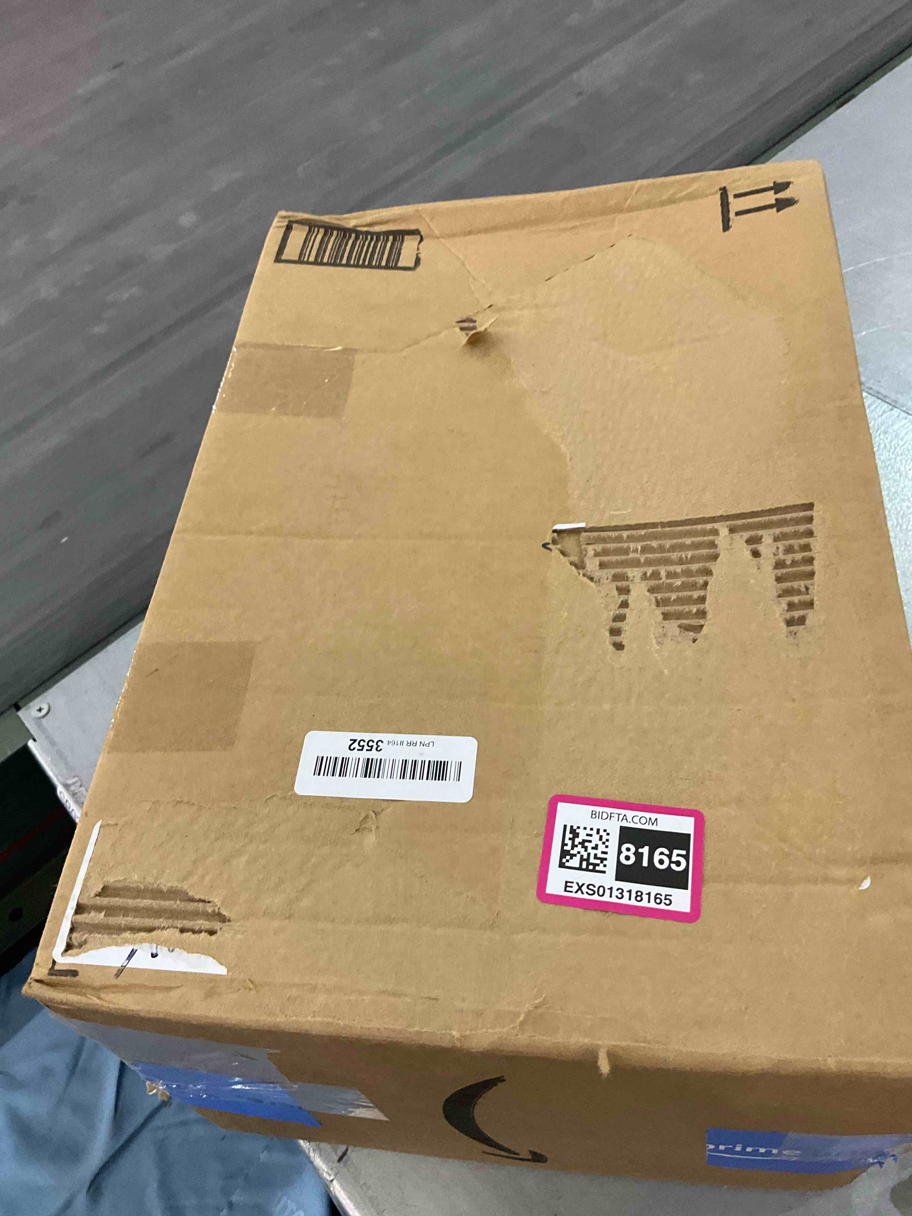 https://s3.amazonaws.com/lotting-images-prod/BargainHunt/EXS01318165_1710514669853.jpeg