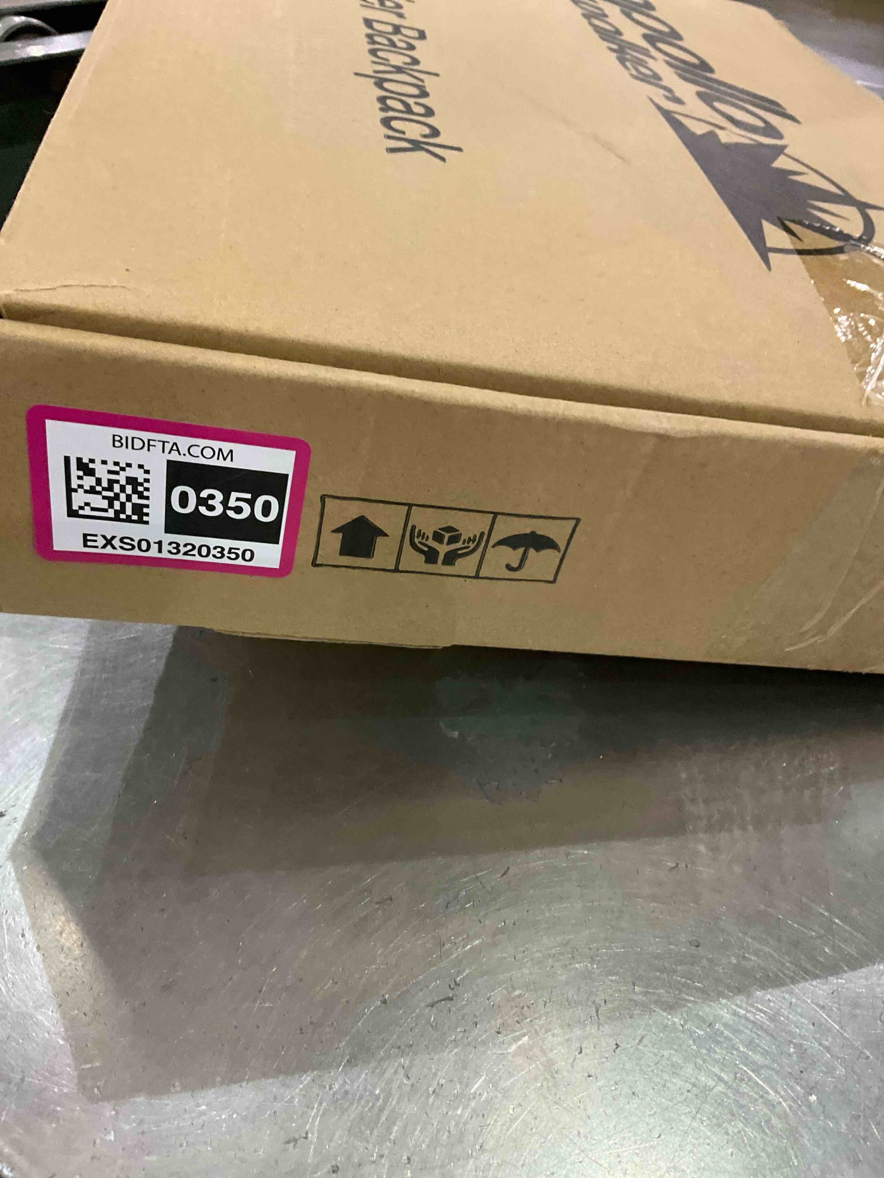 https://s3.amazonaws.com/lotting-images-prod/BargainHunt/EXS01320350_1712068088427.jpeg