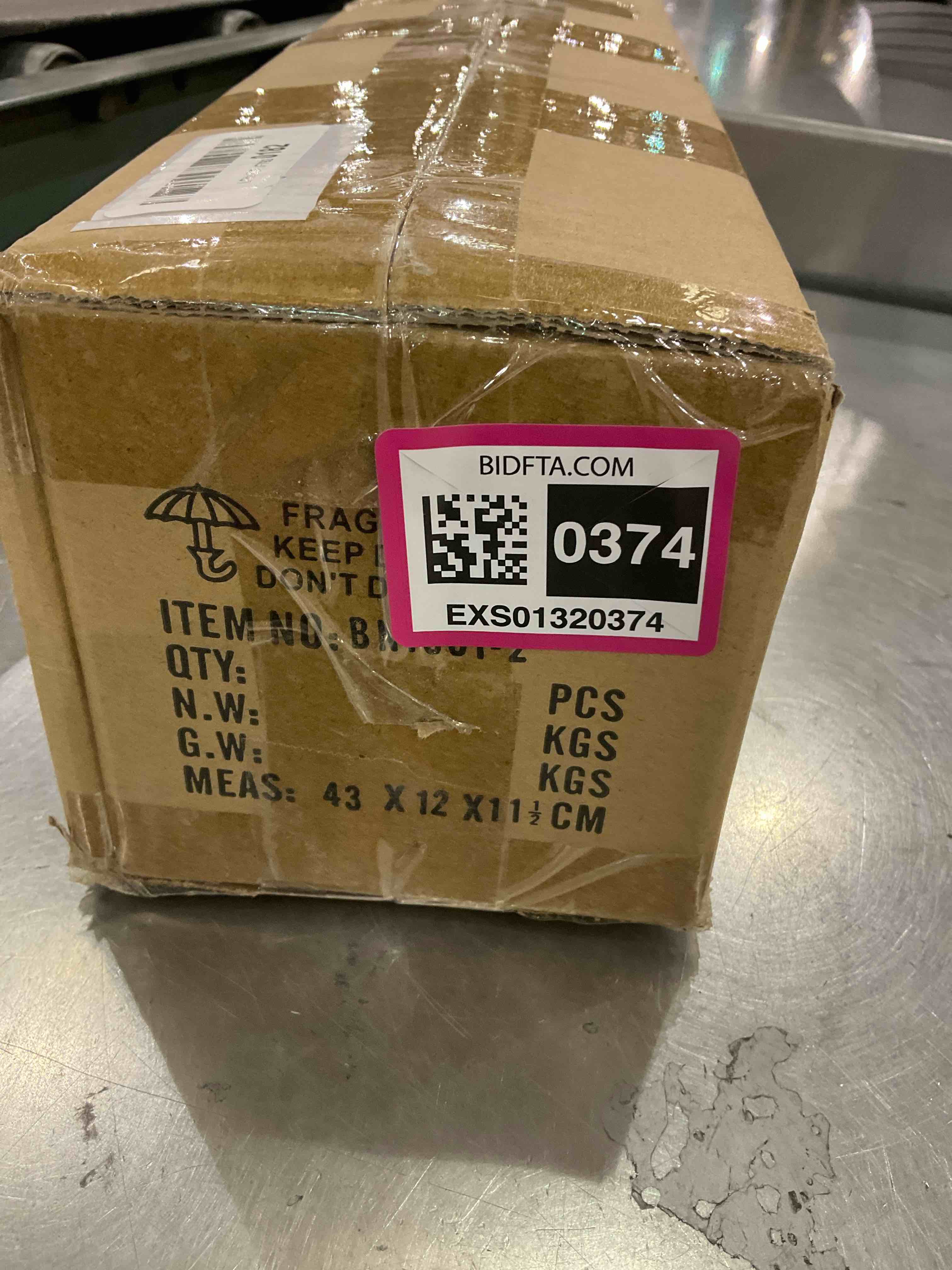 https://s3.amazonaws.com/lotting-images-prod/BargainHunt/EXS01320374_1712070616781.jpeg