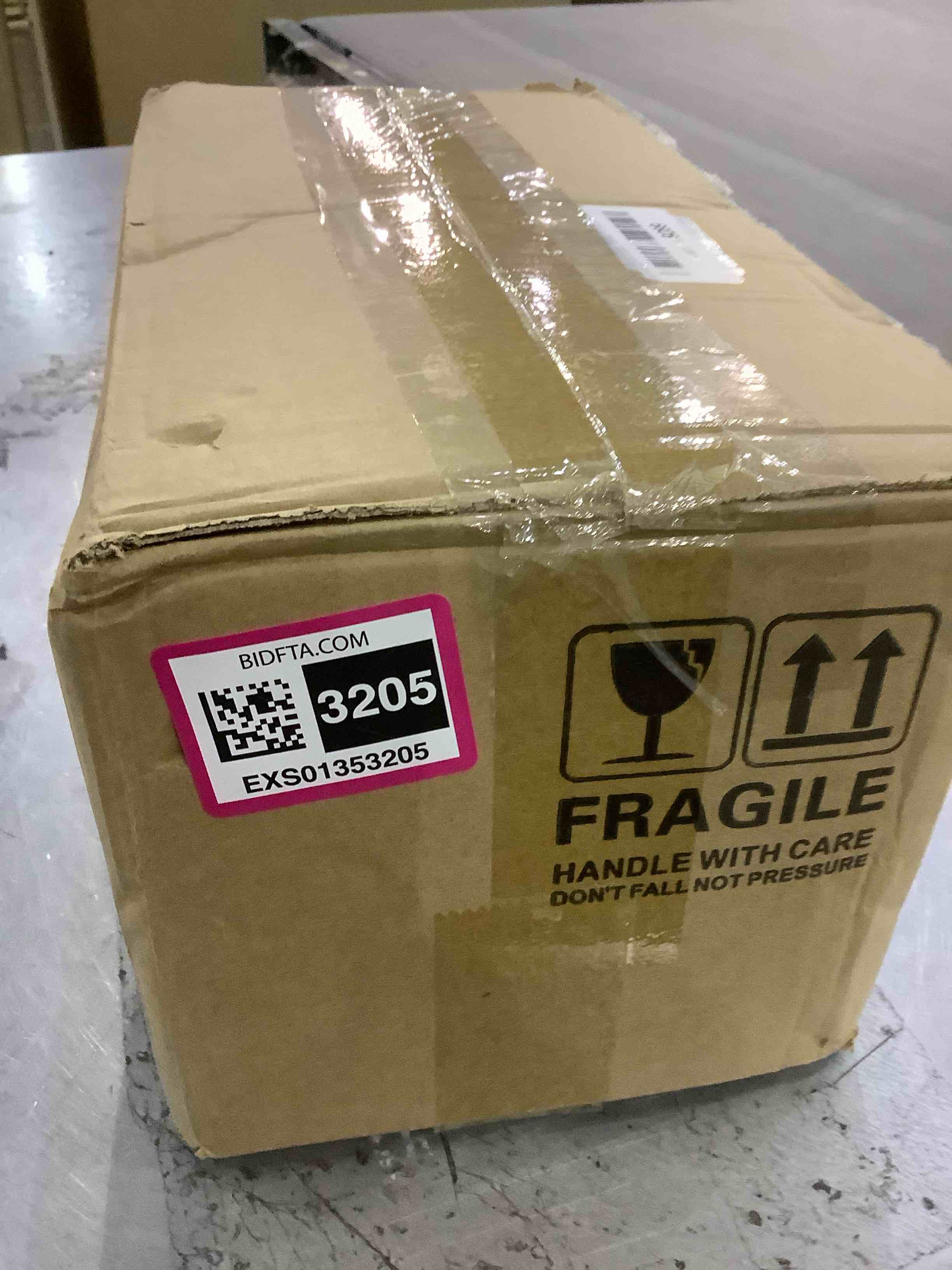 https://s3.amazonaws.com/lotting-images-prod/BargainHunt/EXS01353205_1711462203370.jpeg