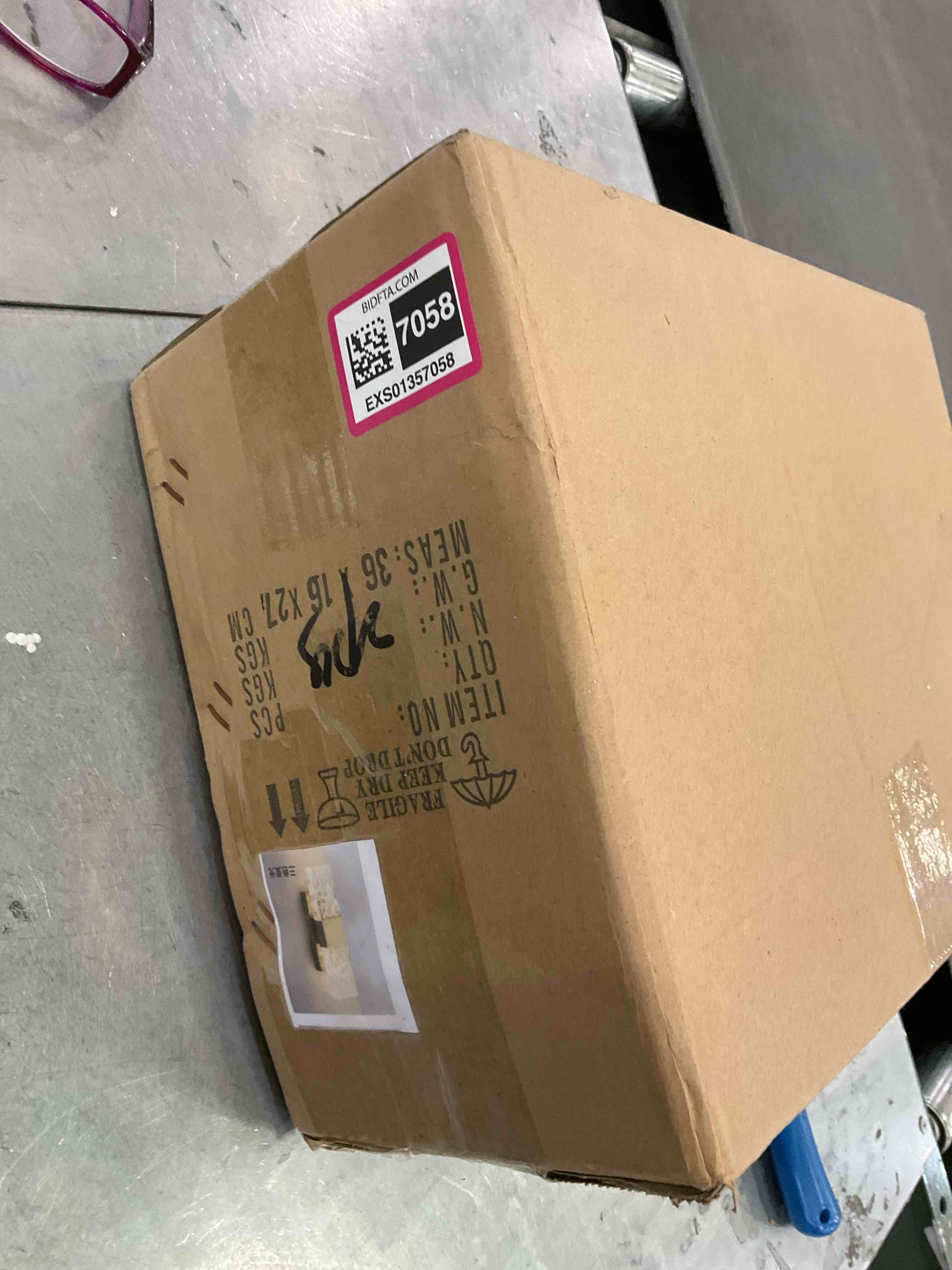 https://s3.amazonaws.com/lotting-images-prod/BargainHunt/EXS01357058_1711553739960.jpeg