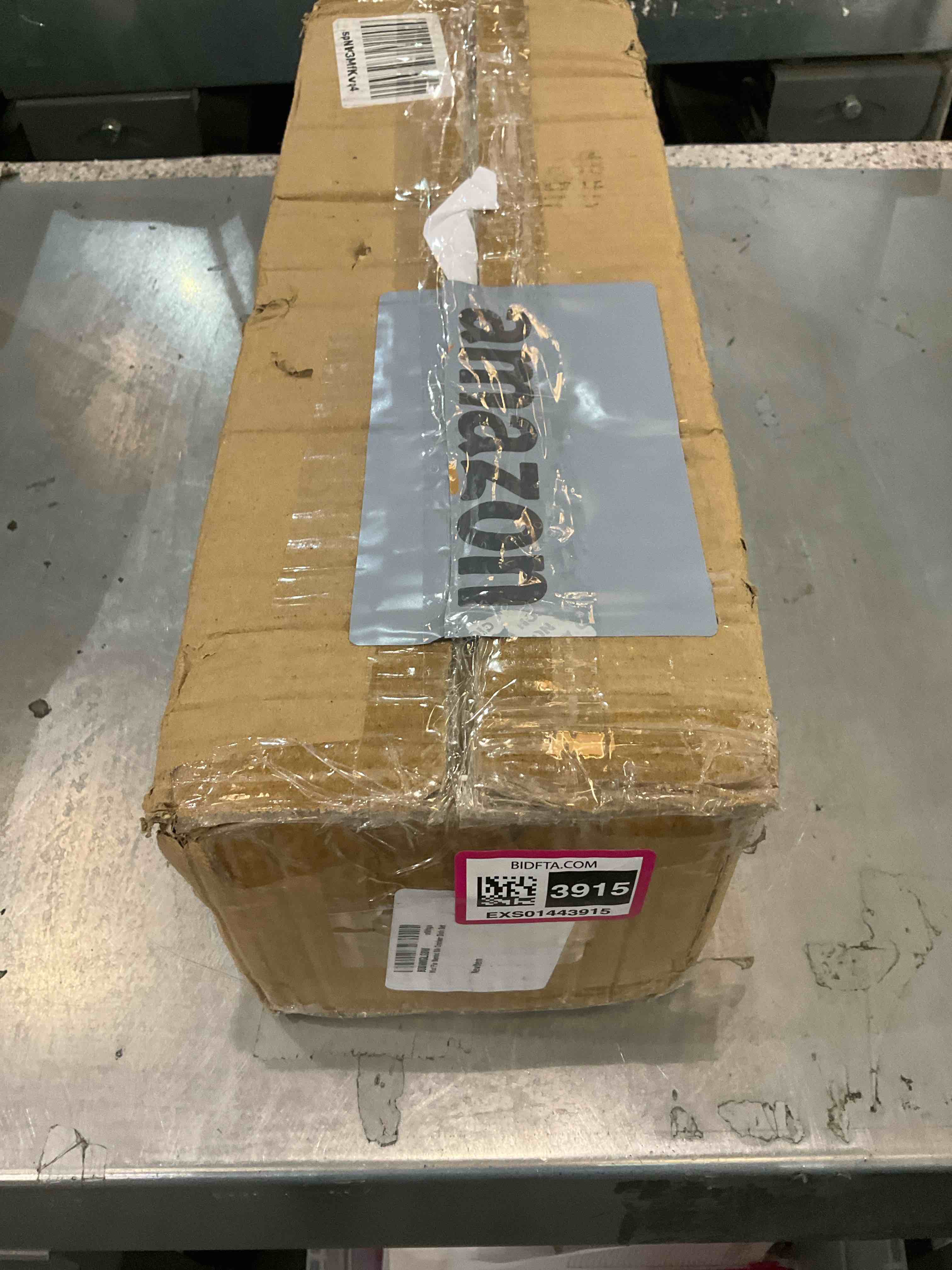 https://s3.amazonaws.com/lotting-images-prod/BargainHunt/EXS01443915_1717600904623.jpeg