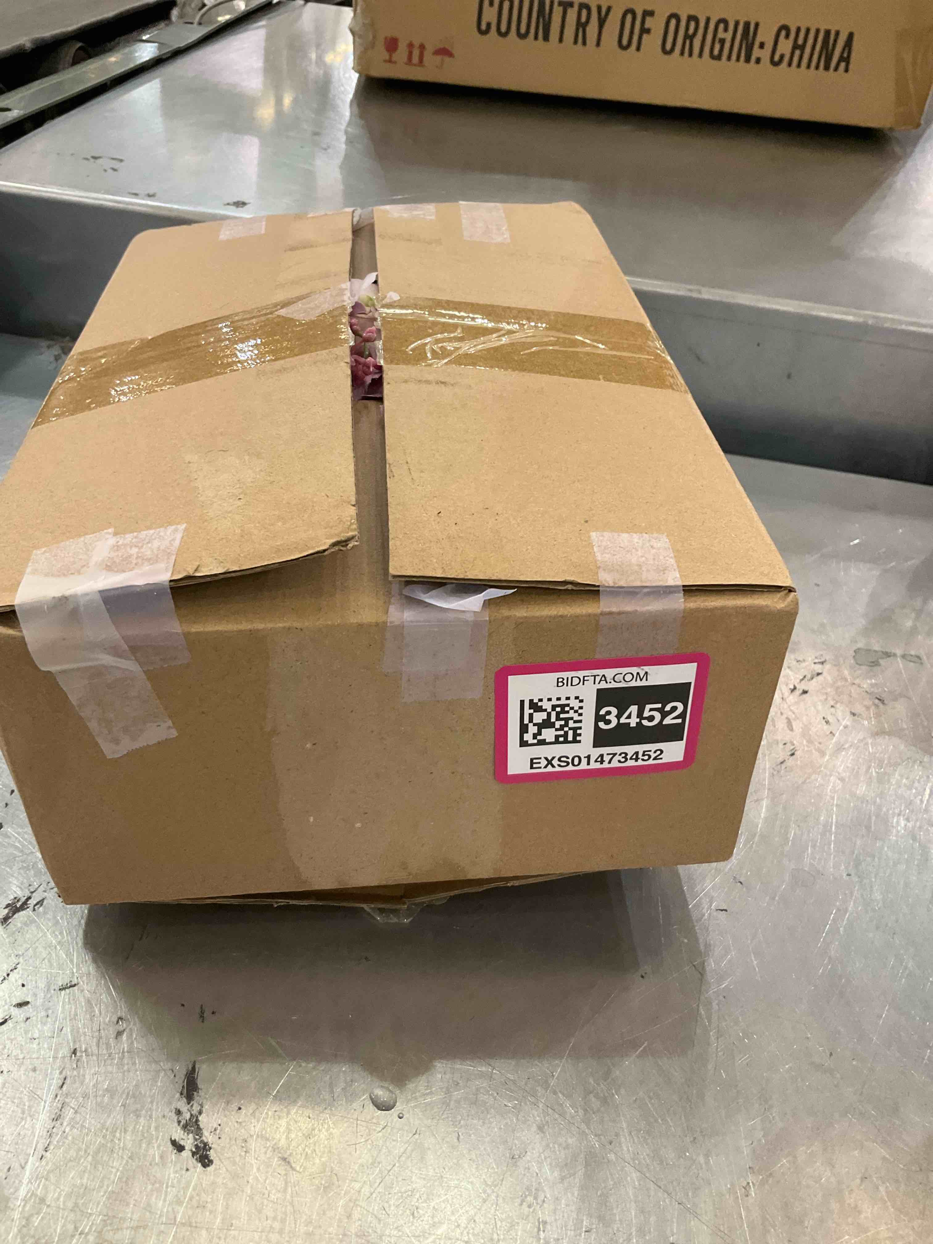https://s3.amazonaws.com/lotting-images-prod/BargainHunt/EXS01473452_1719327868646.jpeg