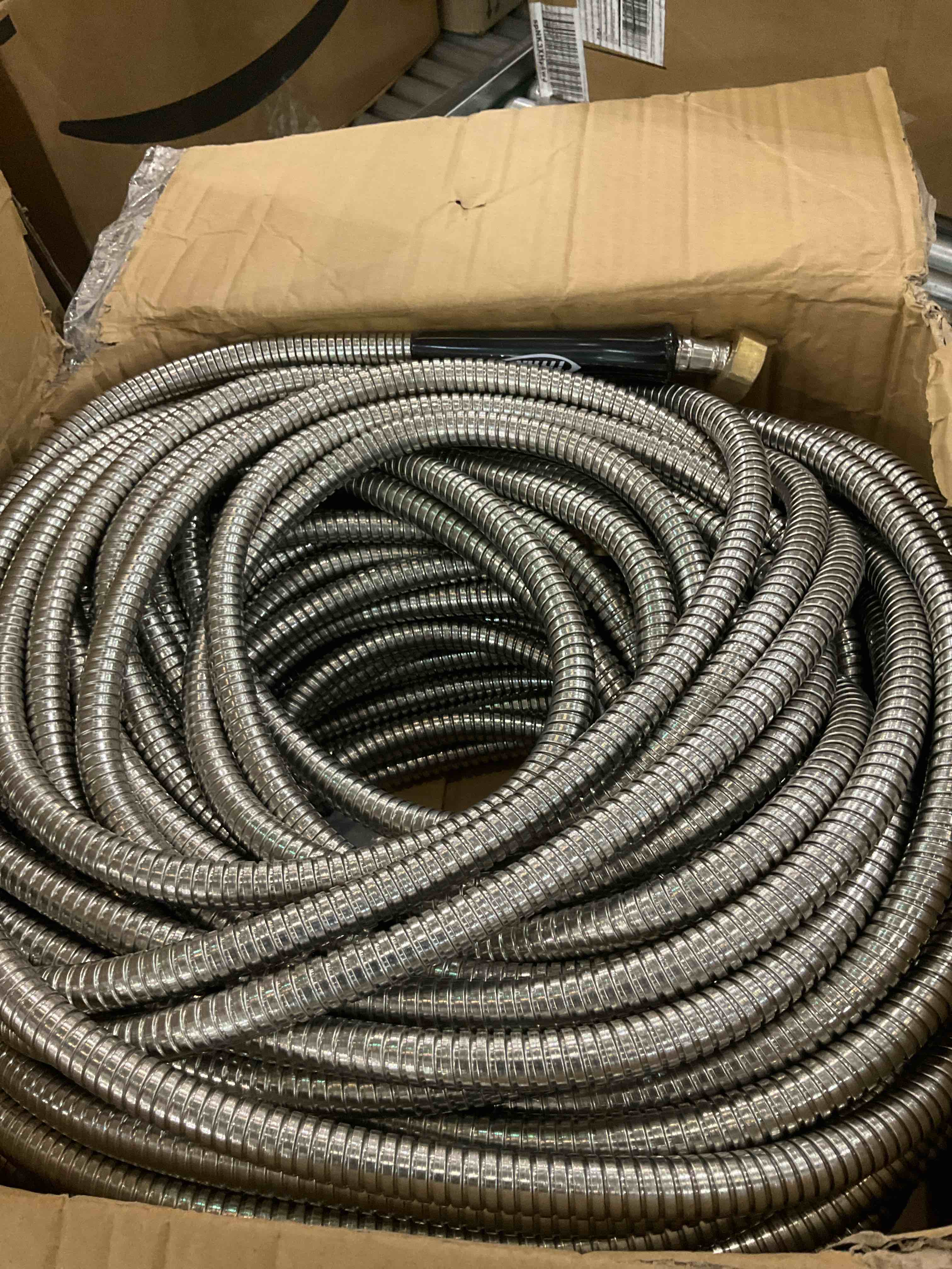 TITAN 200FT Metal Garden Hose - Flexible Water Hose with Solid 3/4" Brass Connectors 360 Degree Brass Jet Sprayer Nozzle - Lightweight Kink Free Strong and Durable Heavy Duty 304 Stainless Steel