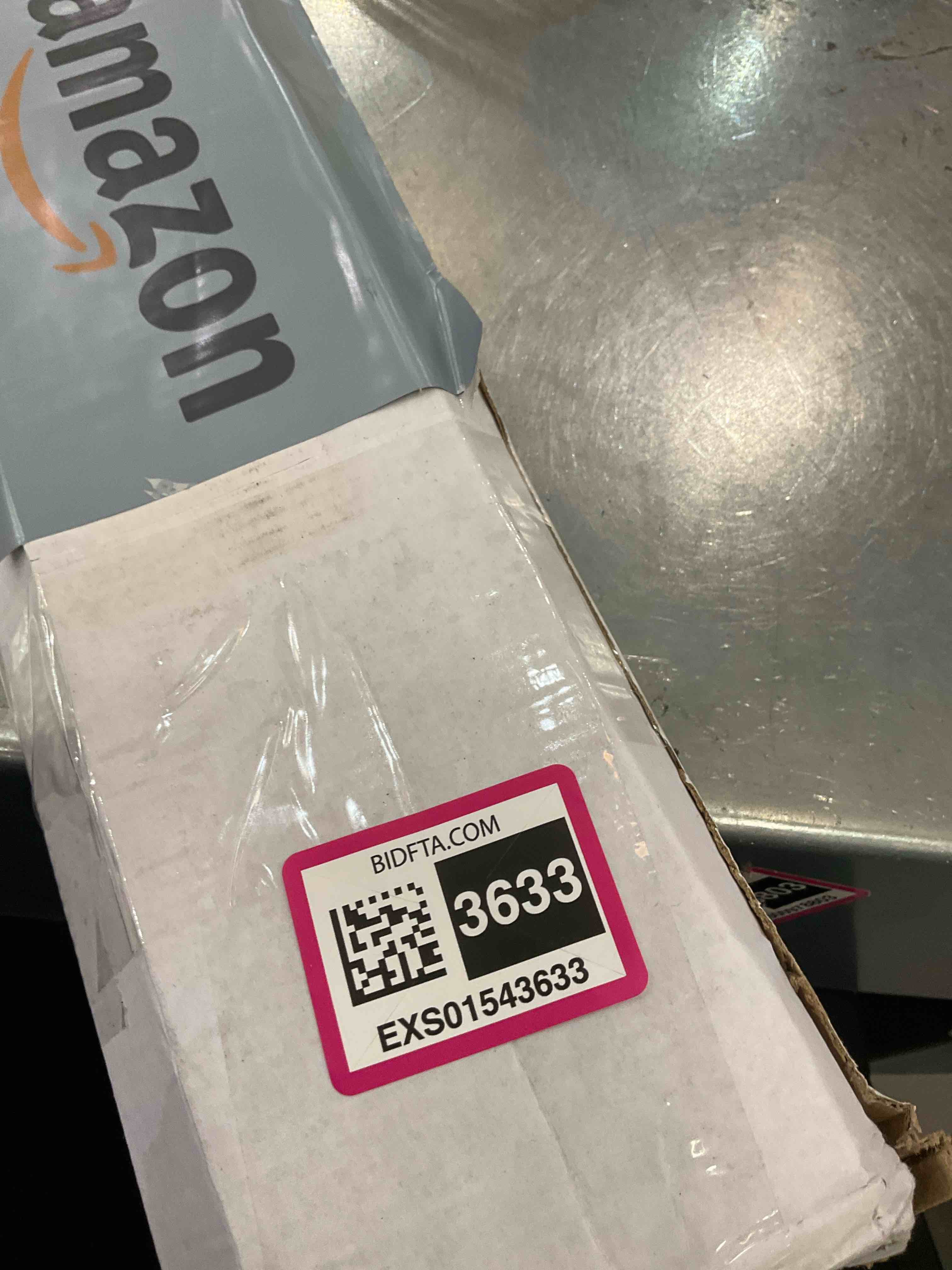 https://s3.amazonaws.com/lotting-images-prod/BargainHunt/EXS01543633_1714502254056.jpeg