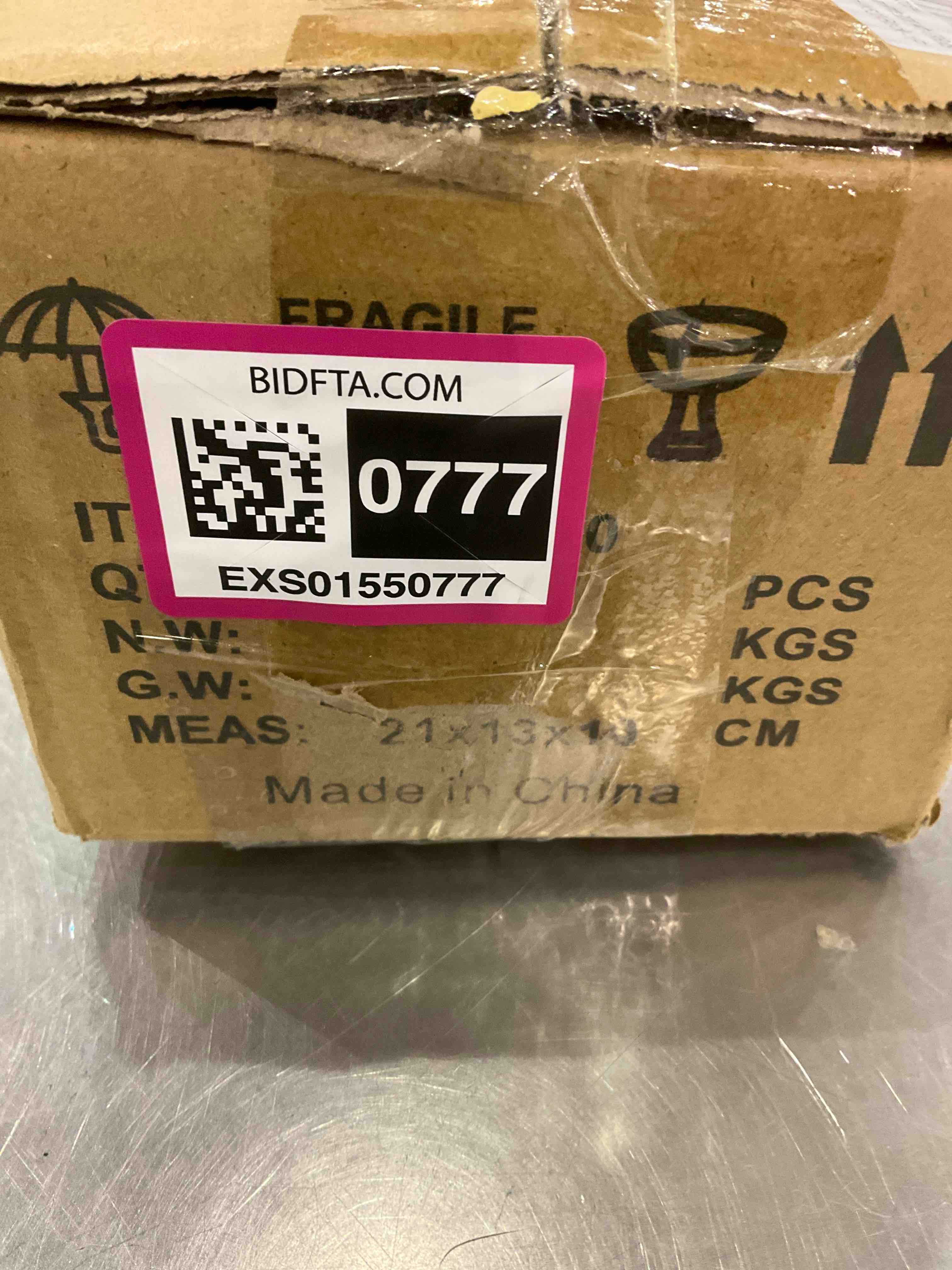 https://s3.amazonaws.com/lotting-images-prod/BargainHunt/EXS01550777_1715688577223.jpeg