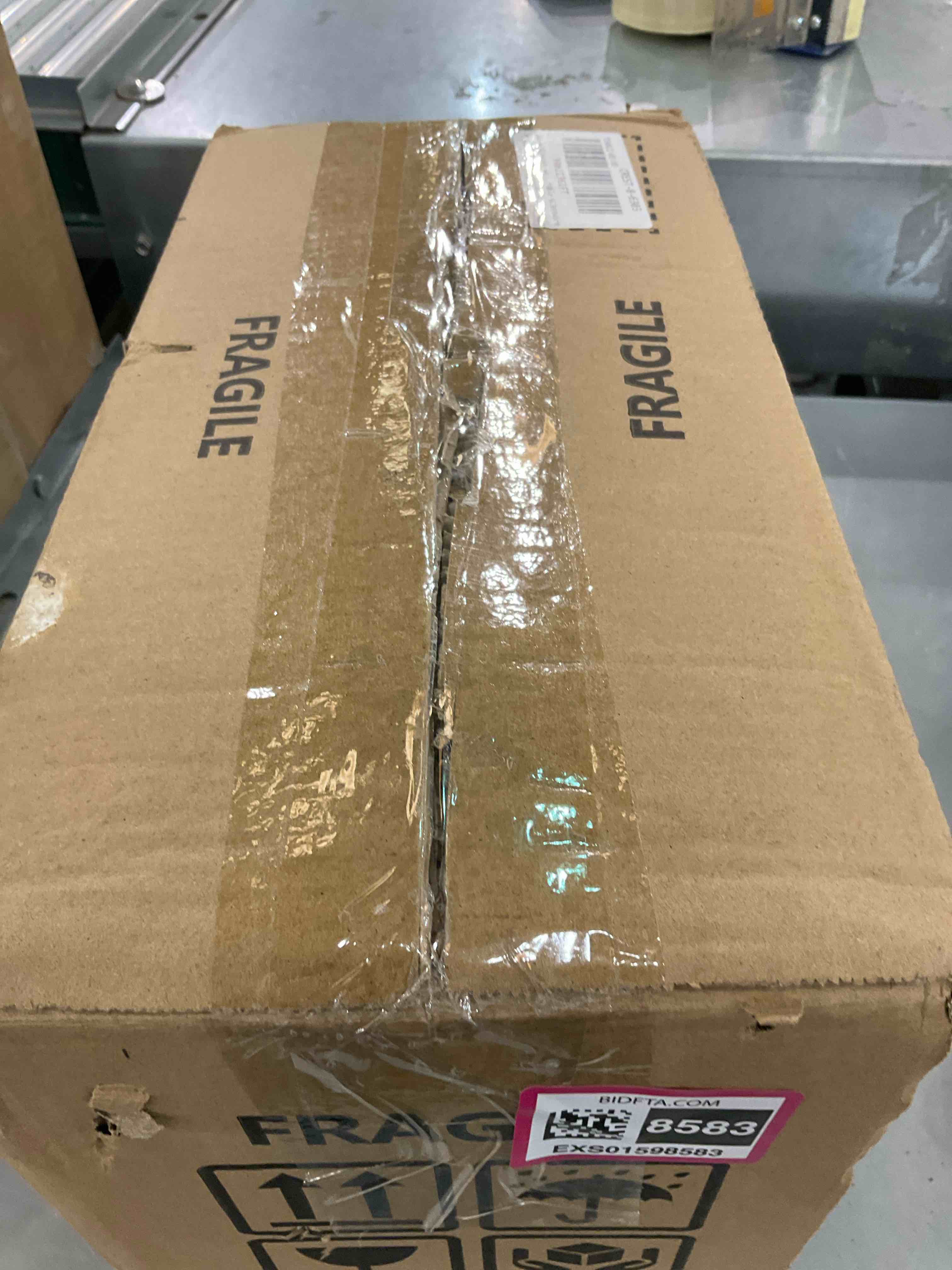 https://s3.amazonaws.com/lotting-images-prod/BargainHunt/EXS01598583_1719232537584.jpeg