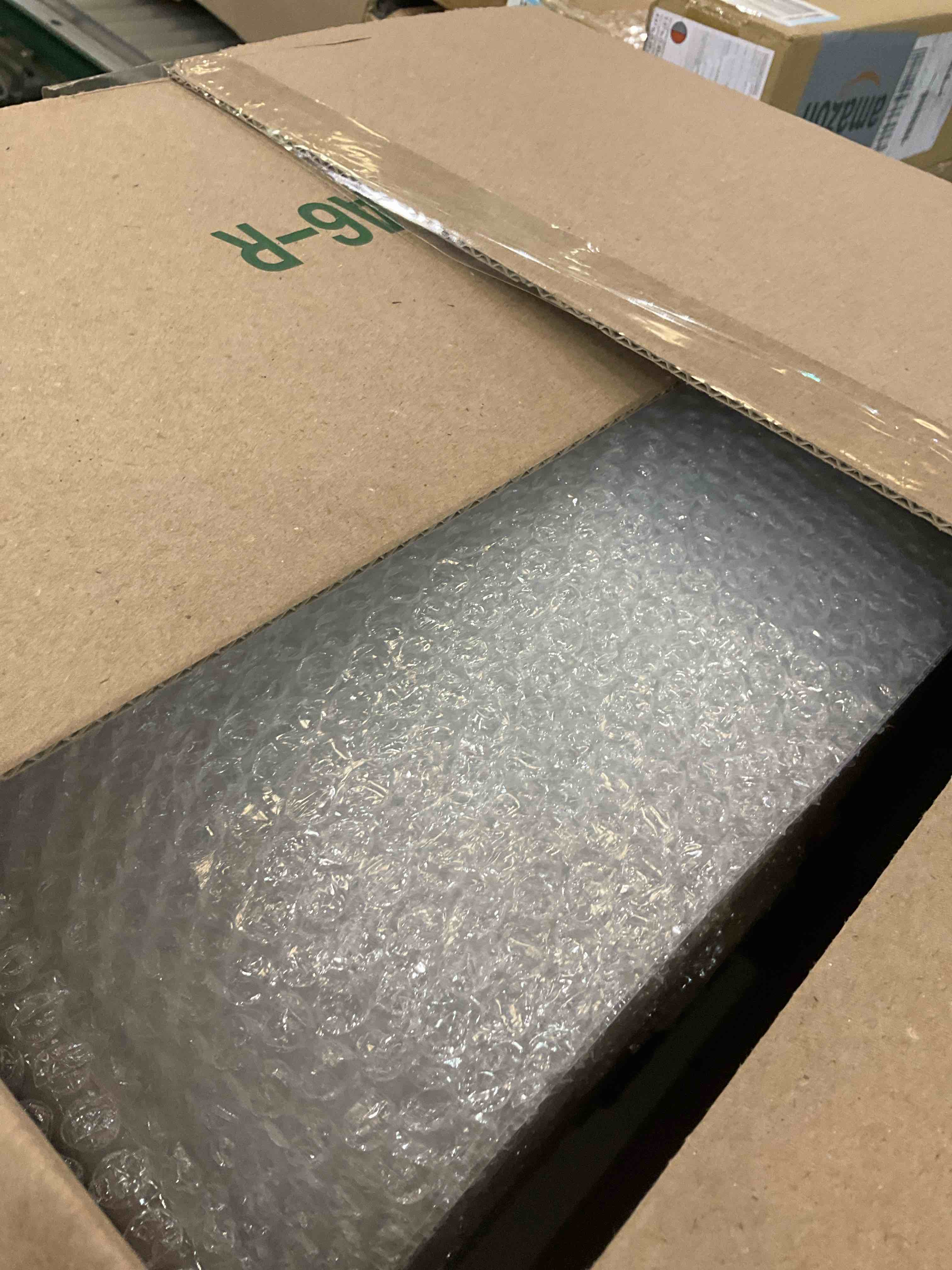 Amazon Basics Perforated Bubble Cushioning Wrap, Small 3/16", 12-Inch x 175 Foot Long Roll, Clear