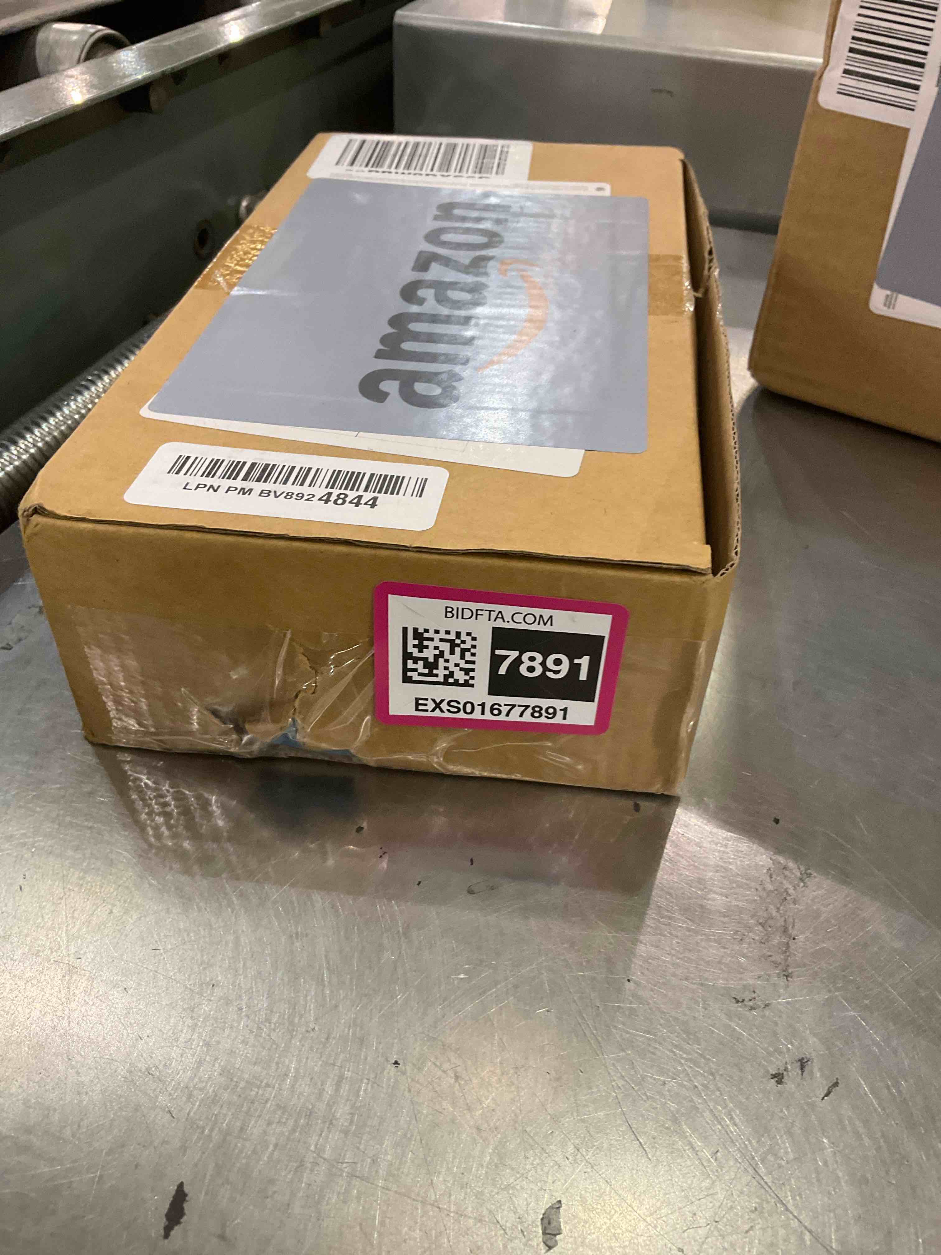 https://s3.amazonaws.com/lotting-images-prod/BargainHunt/EXS01677891_1714158090168.jpeg