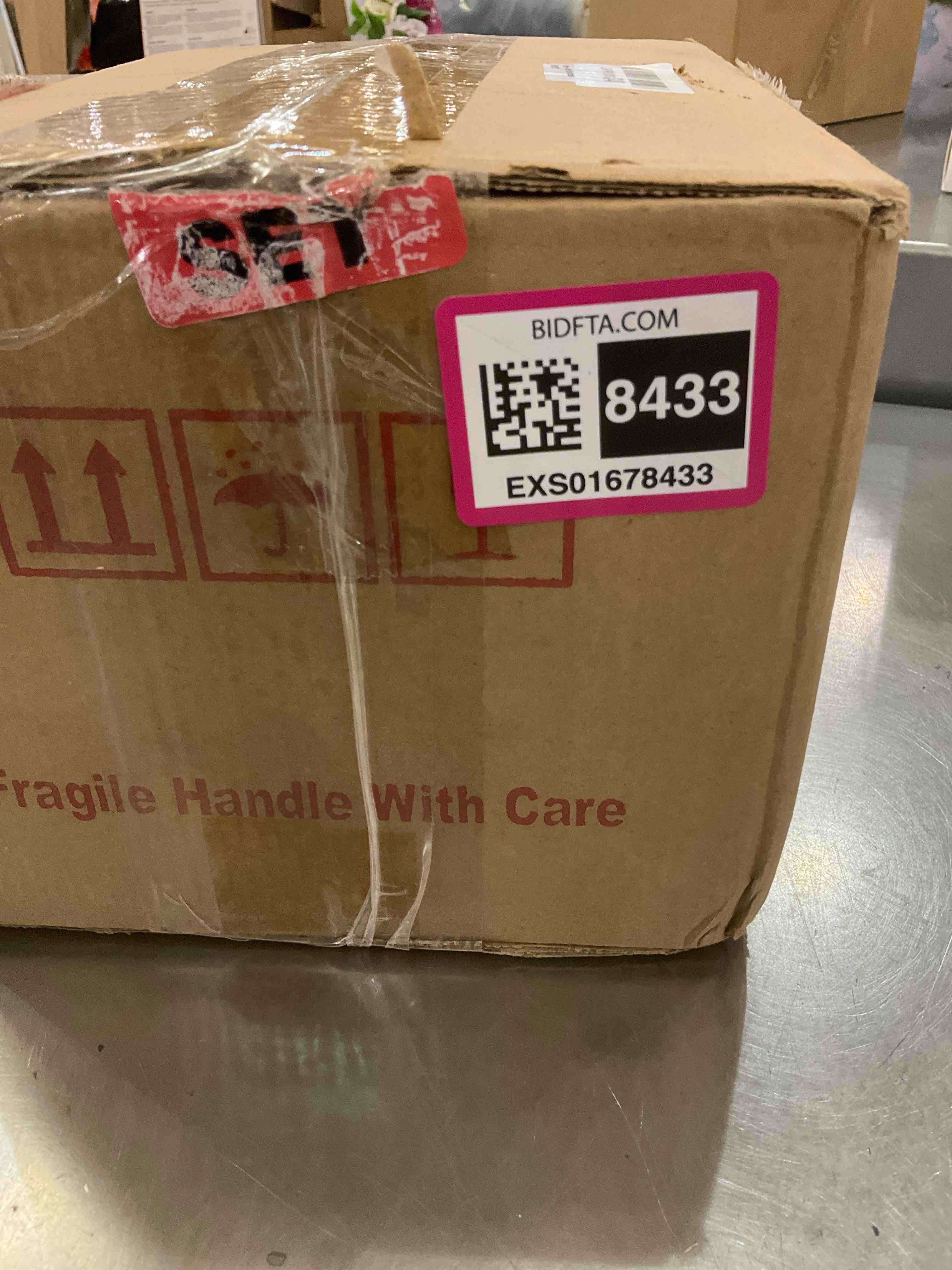 https://s3.amazonaws.com/lotting-images-prod/BargainHunt/EXS01678433_1714575577651.jpeg