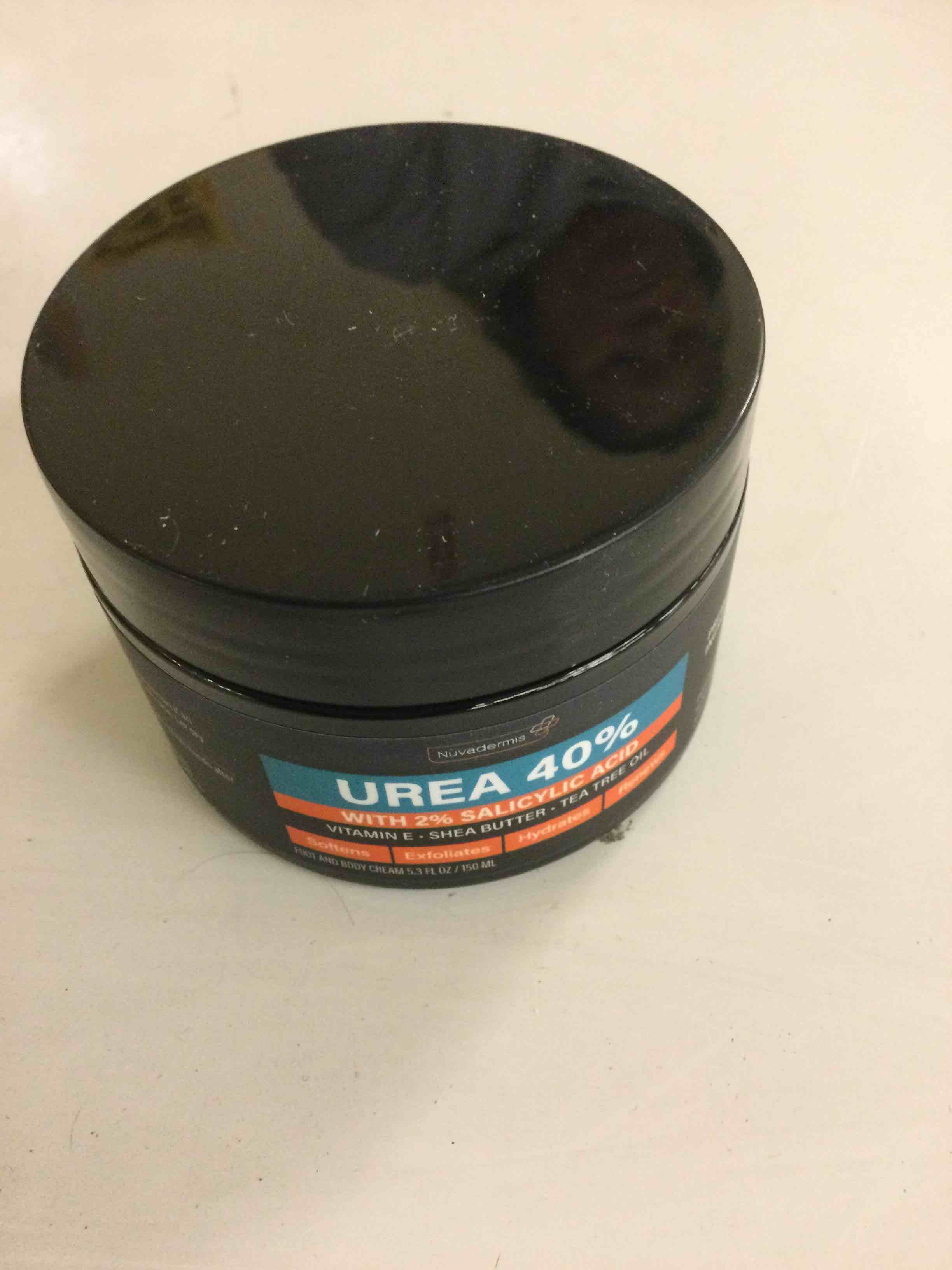 Condition photo showing New/Like New for NUVADERMIS Urea Cream 40 Percent for Feet Maximum Strength - 40% Urea Foot Cream for Dry Cracked Heels and Feet - 2% Salicylic Acid, Shea Butter, Tea Tree Oil, Vitamin E - 5.3 fl oz Regular - 1 Pack