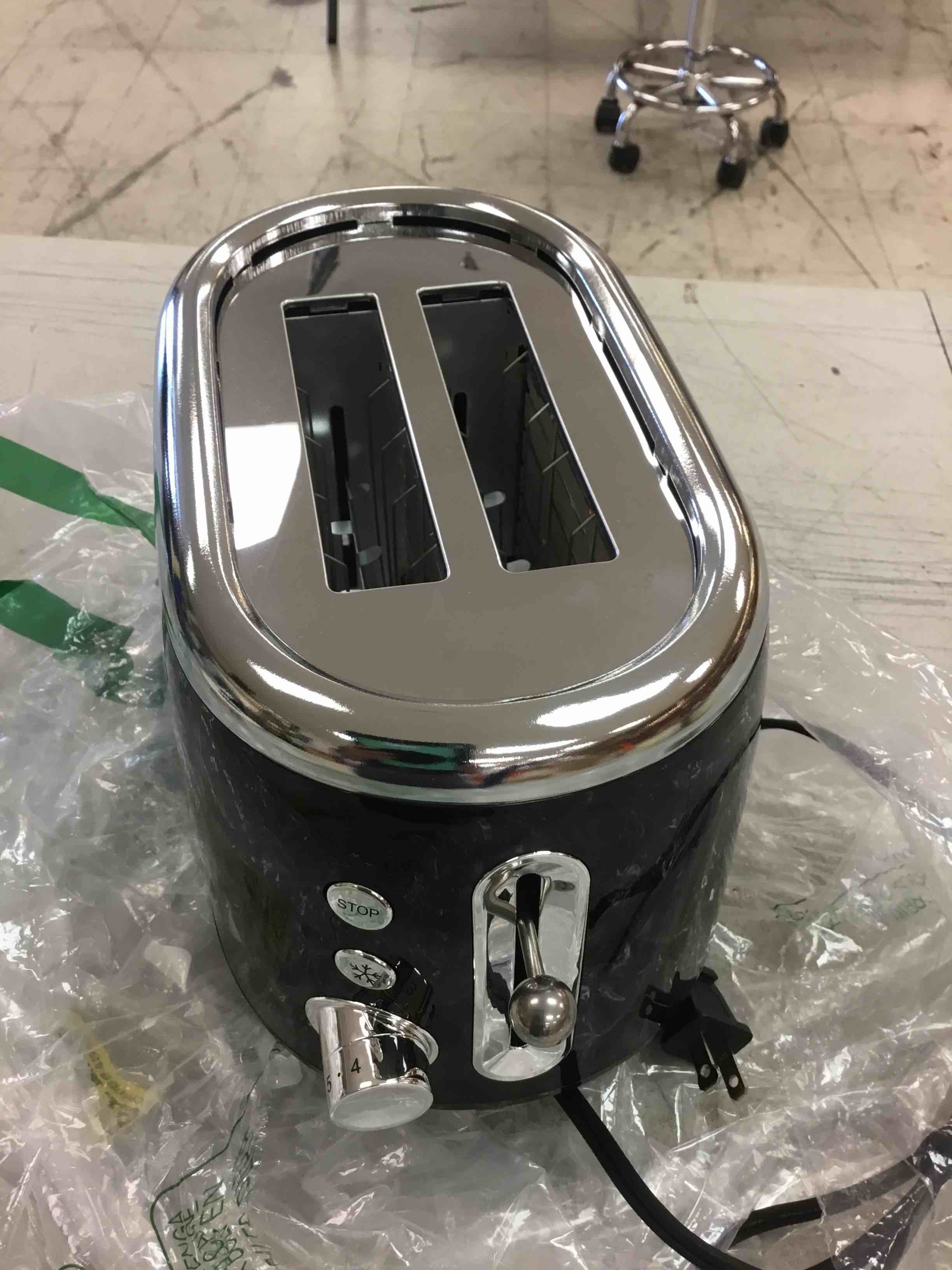 Condition photo showing As Is for mellerhome retro toaster 2 slice, 7 browning levels, 3 functions (reheat, defrost, cancel), removable crumb tray, under base cord storage, black