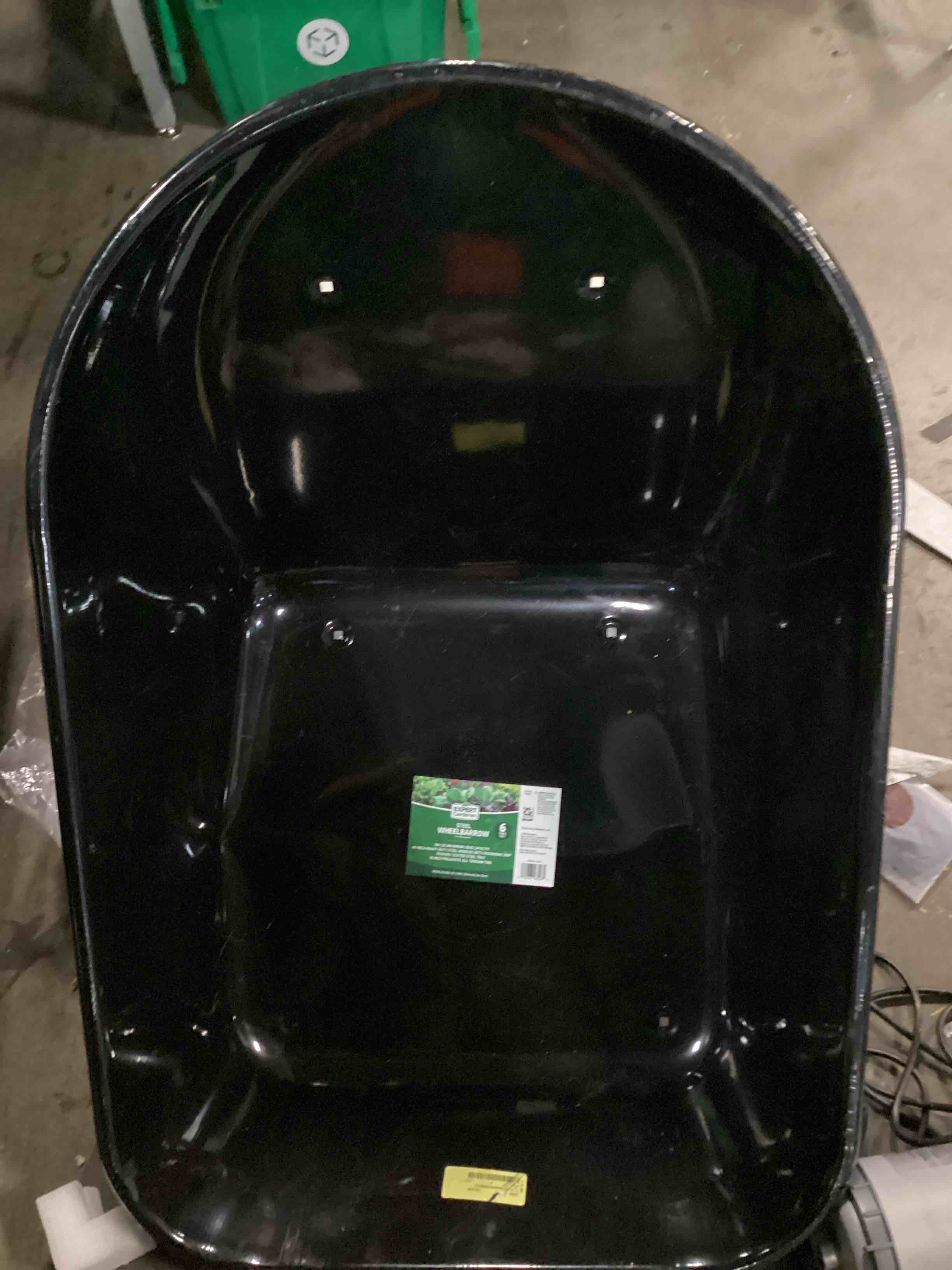 Condition photo showing As Is for expert gardener 6 cu ft steel wheelbarrow